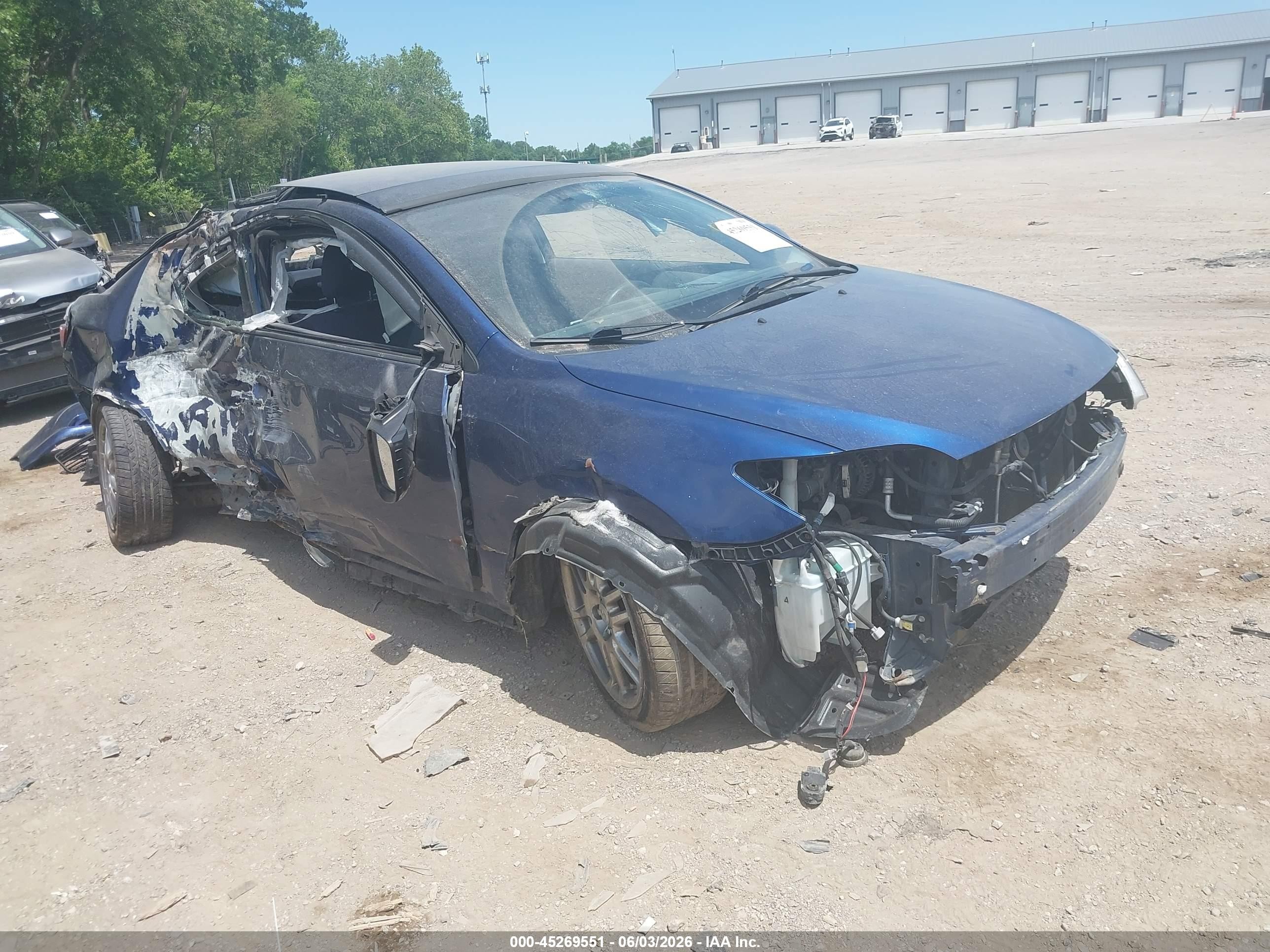 2009 Scion tC, VIN JTKDE167190288582 — Бок