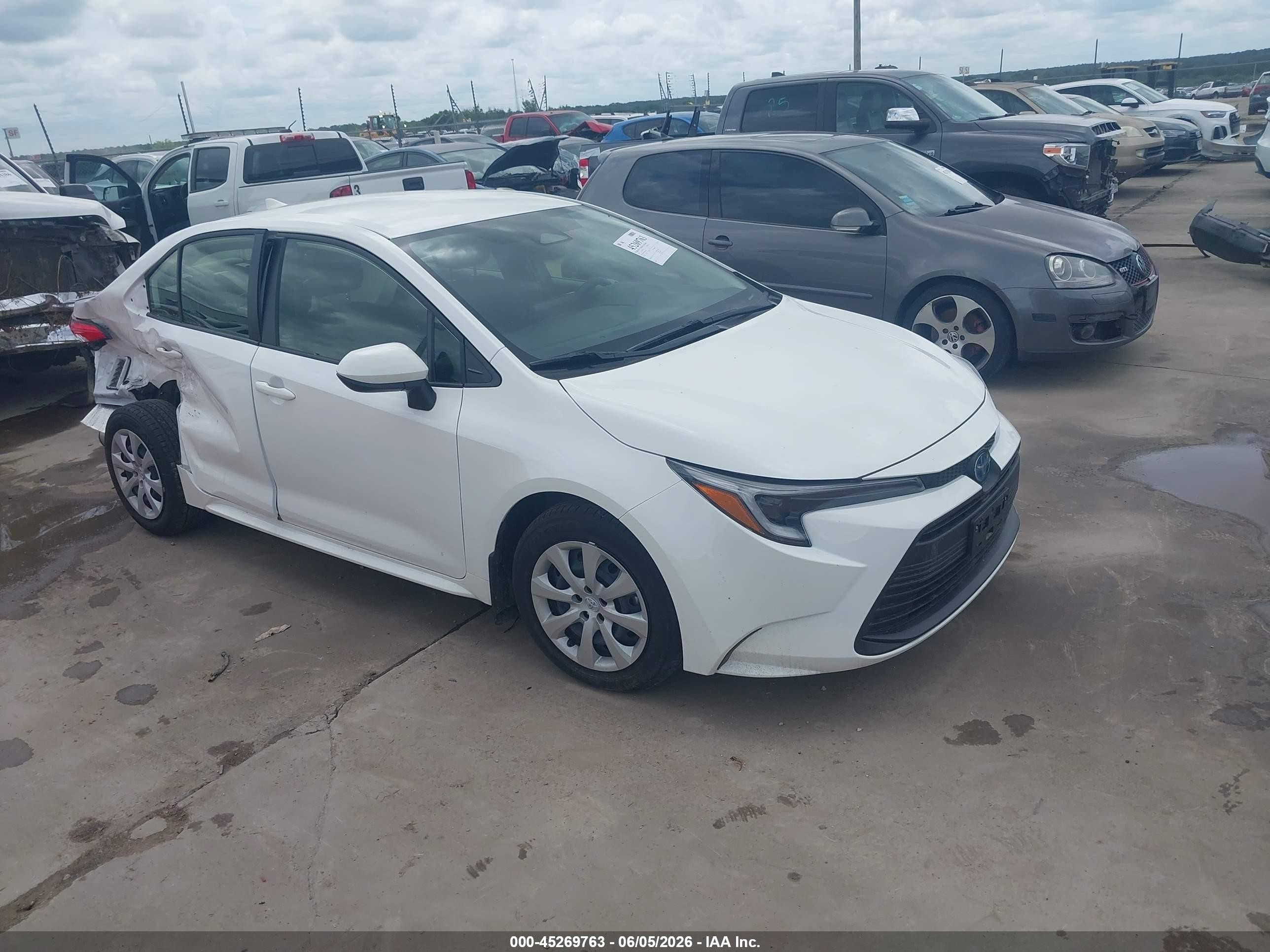 2025 Toyota Corolla Hybrid LE, VIN JTDBCMFEXS3104488 — Side