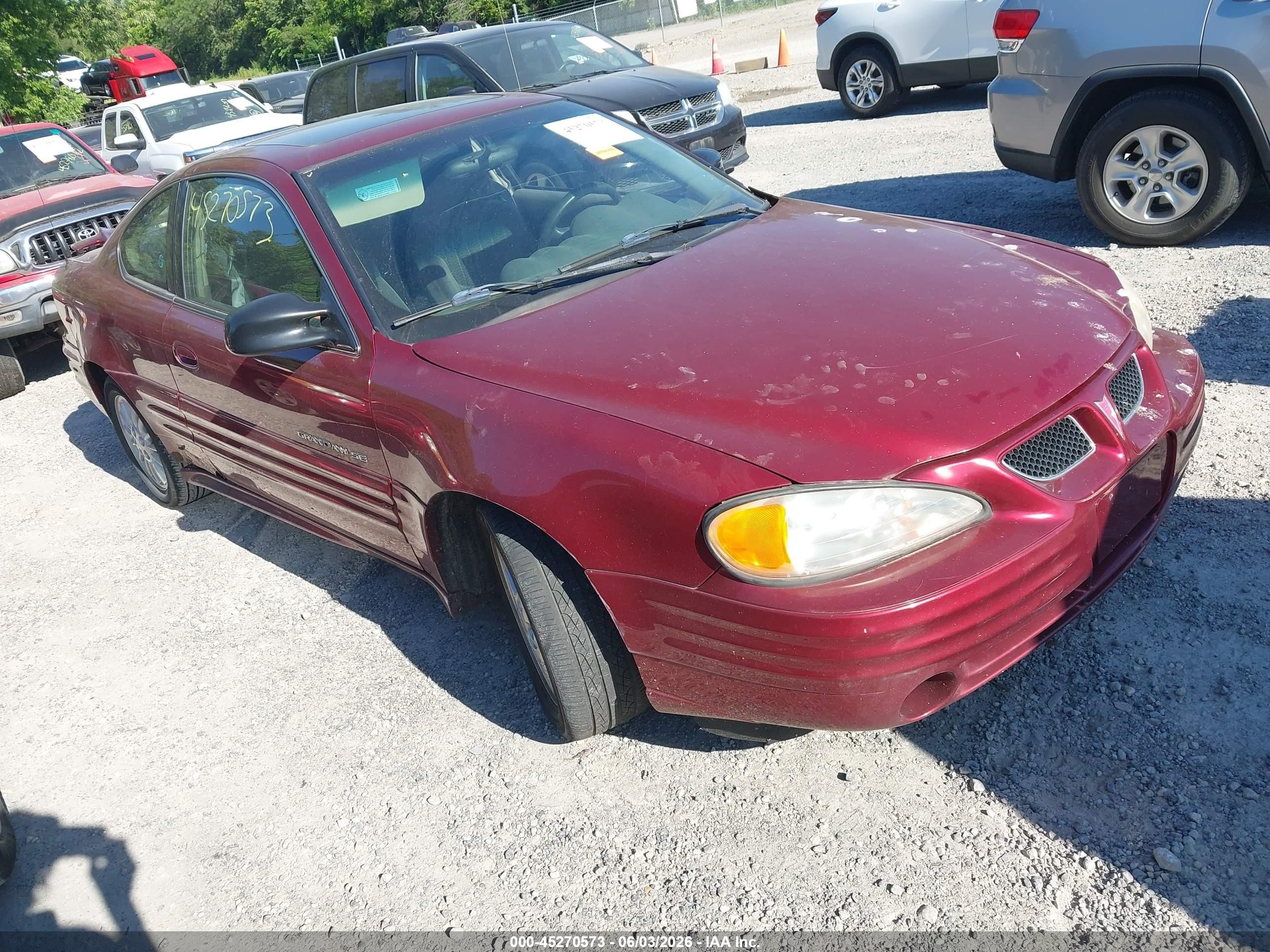 2001 Pontiac Grand Am, VIN 1G2NF12TX1M554596 — Side