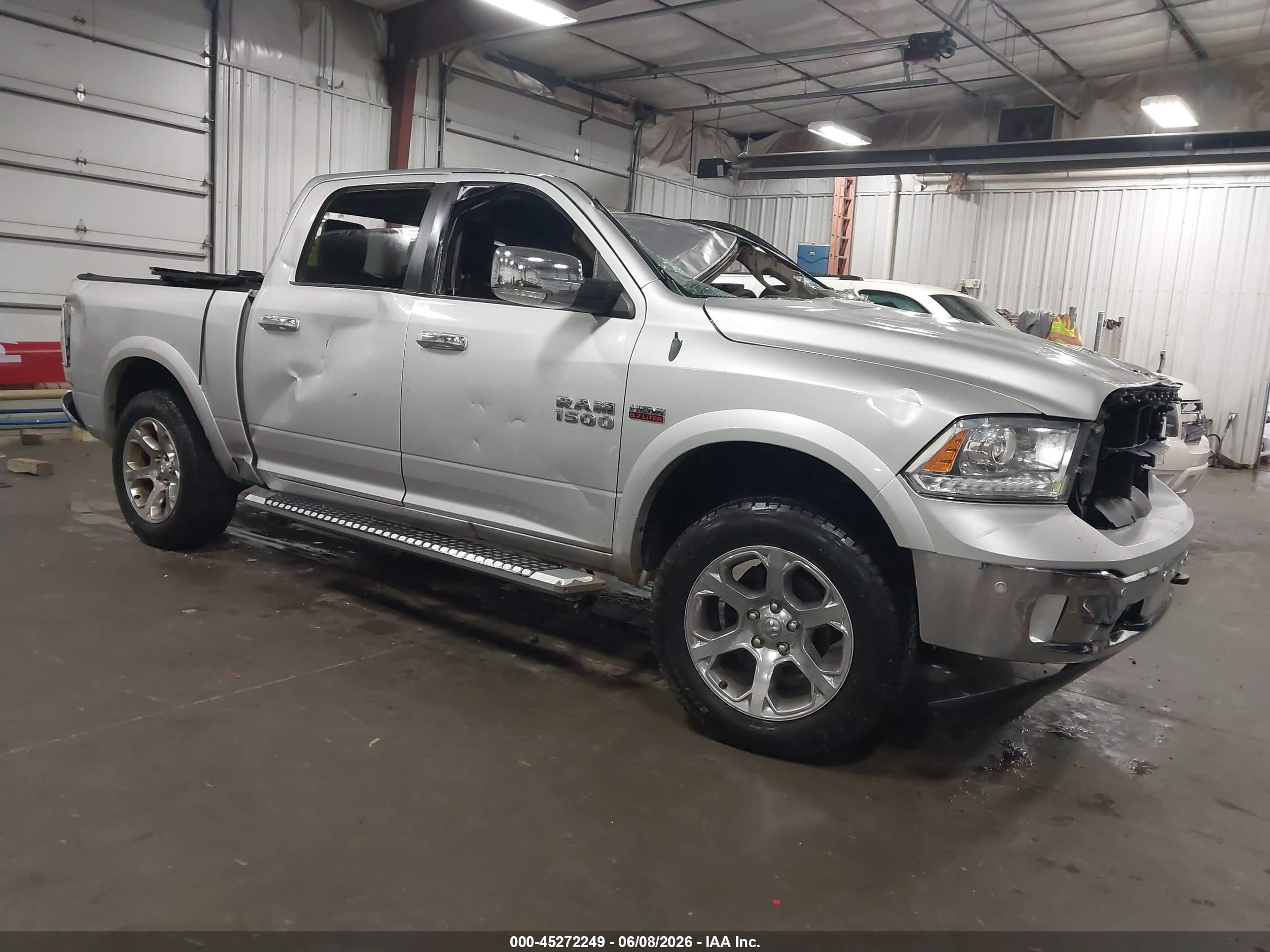 2014 Ram 1500 Laramie, VIN 1C6RR7NT9ES133755 — Rollover