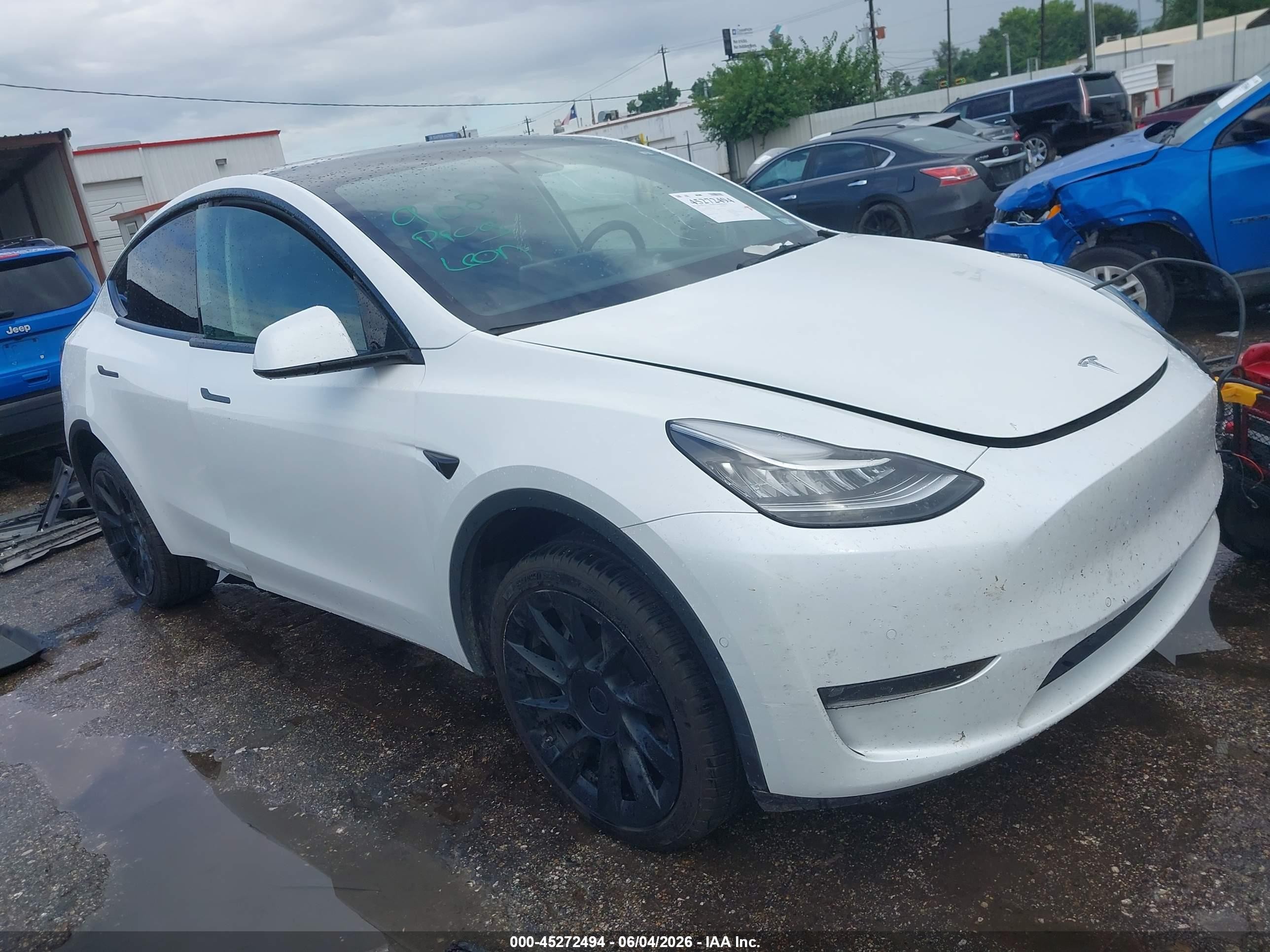 2021 Tesla Model Y Long Range, VIN 5YJYGDEEXMF306236 — Undercarriage