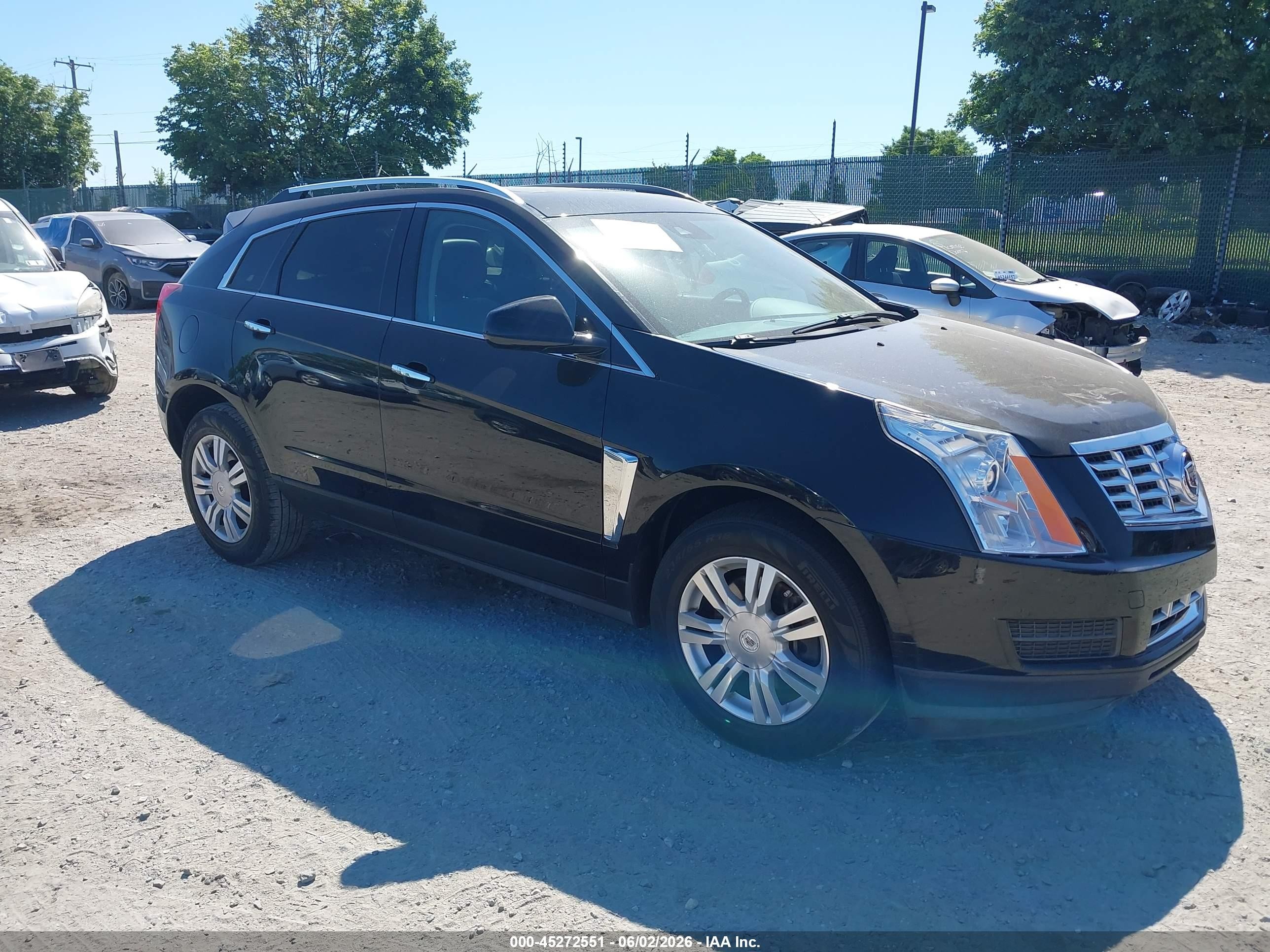2015 Cadillac SRX Luxury Collection, VIN 3GYFNEE31FS612831 — Front end