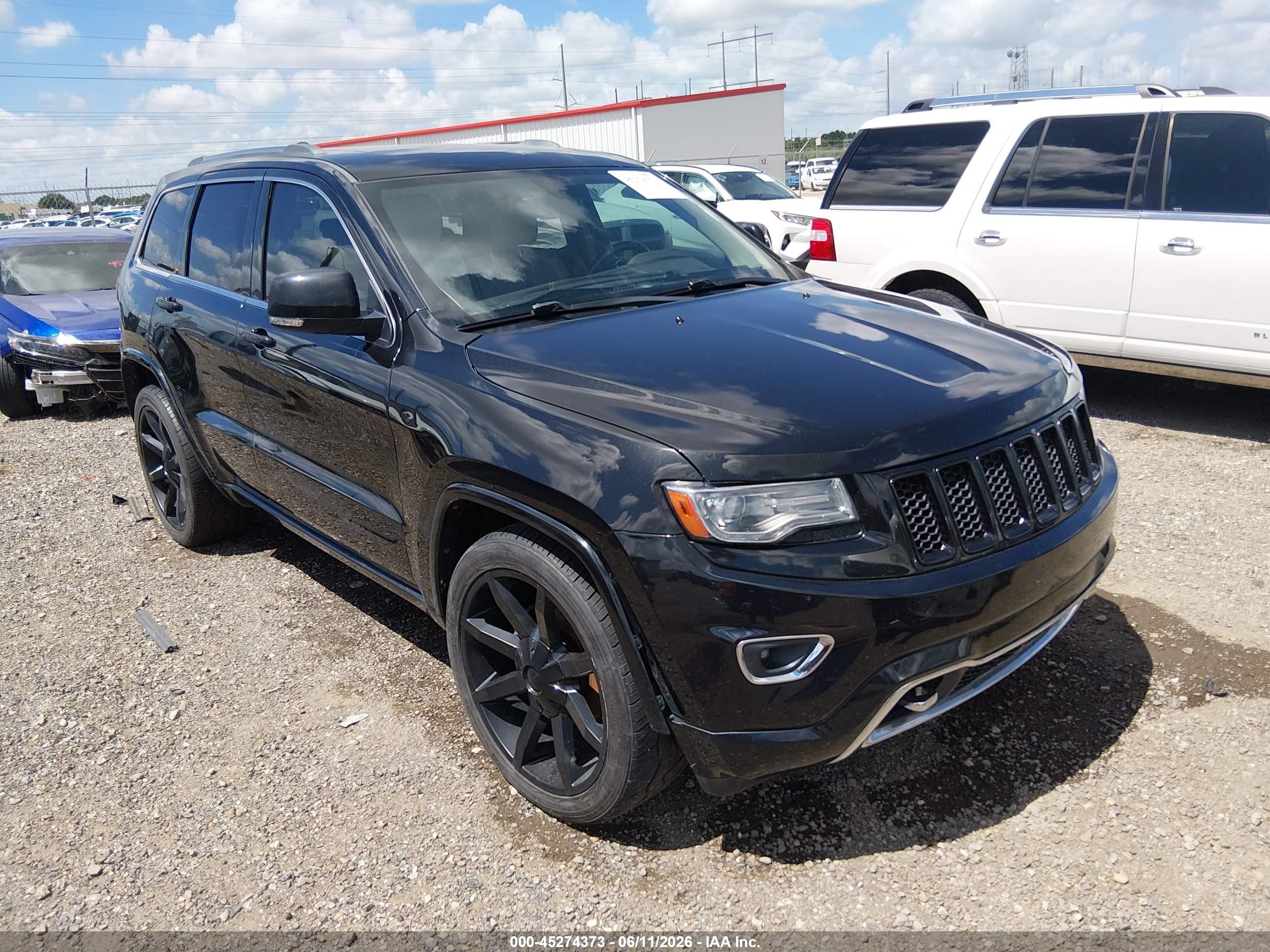 2014 Jeep Grand Cherokee Overland, VIN 1C4RJECT2EC299620 — Undercarriage