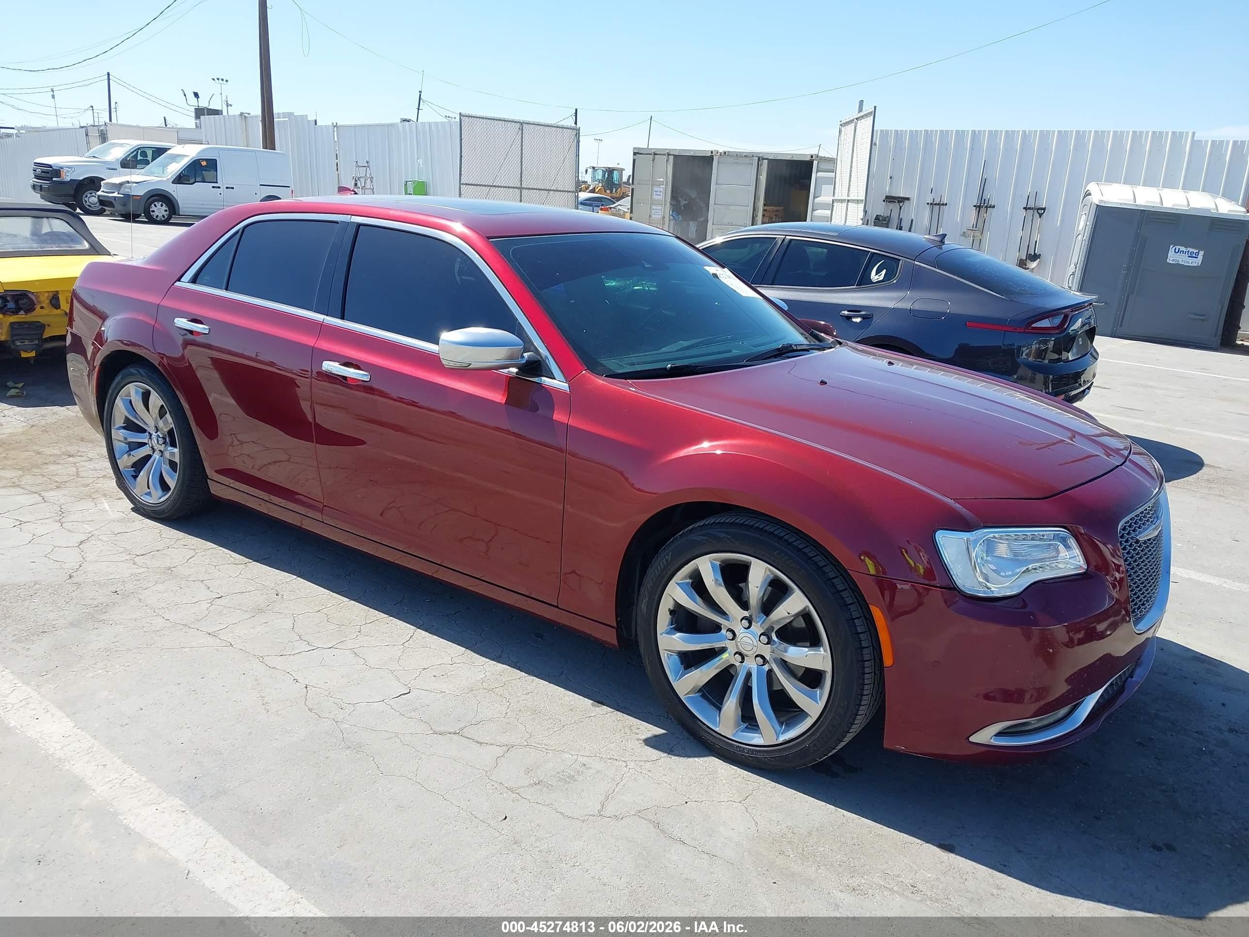2015 Chrysler 300 C Platinum, VIN 2C3CCAPG8FH830537 — Side