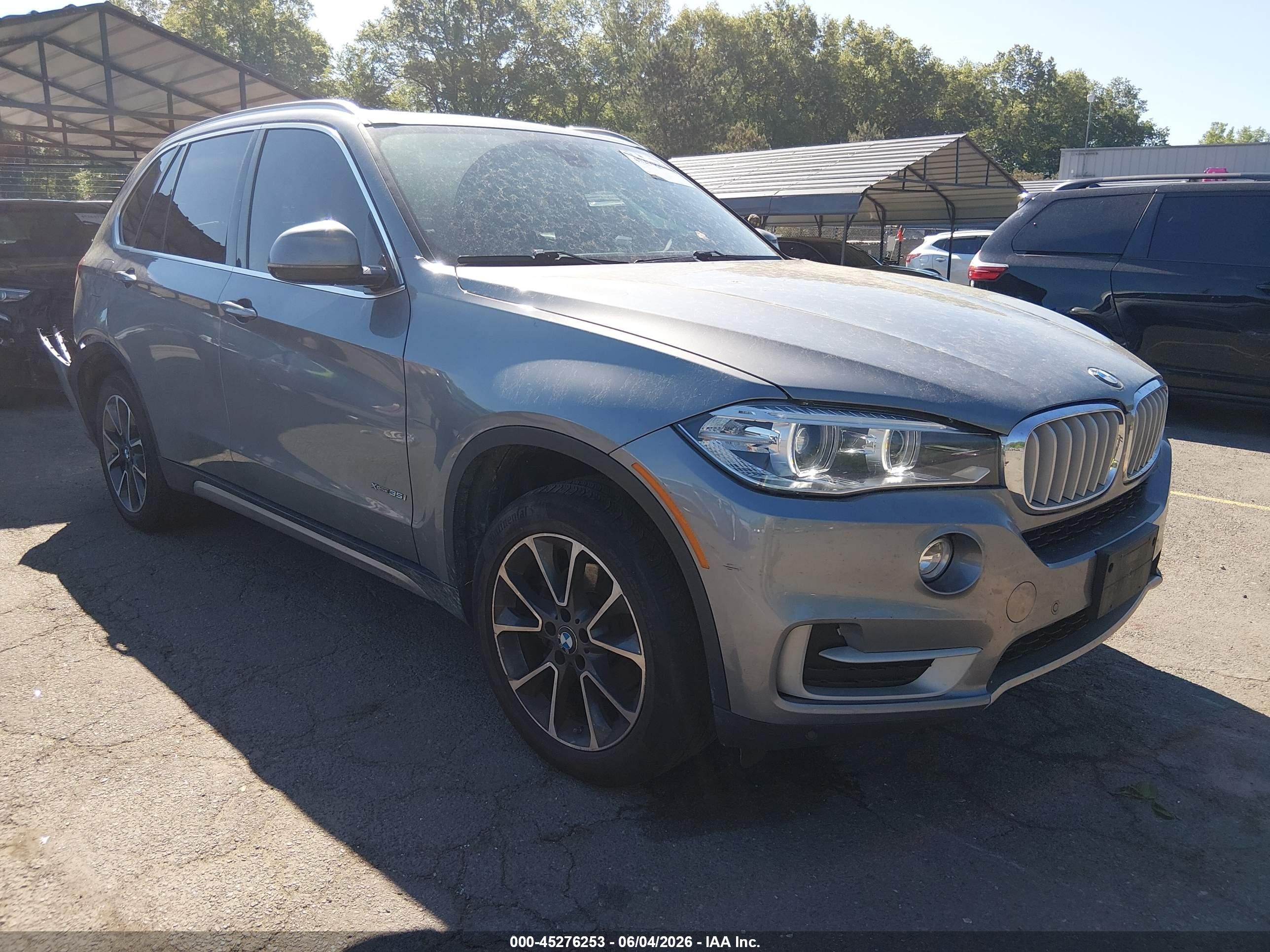 2018 BMW X5 xDrive35i, VIN 5UXKR0C56JL072437 — Rear end