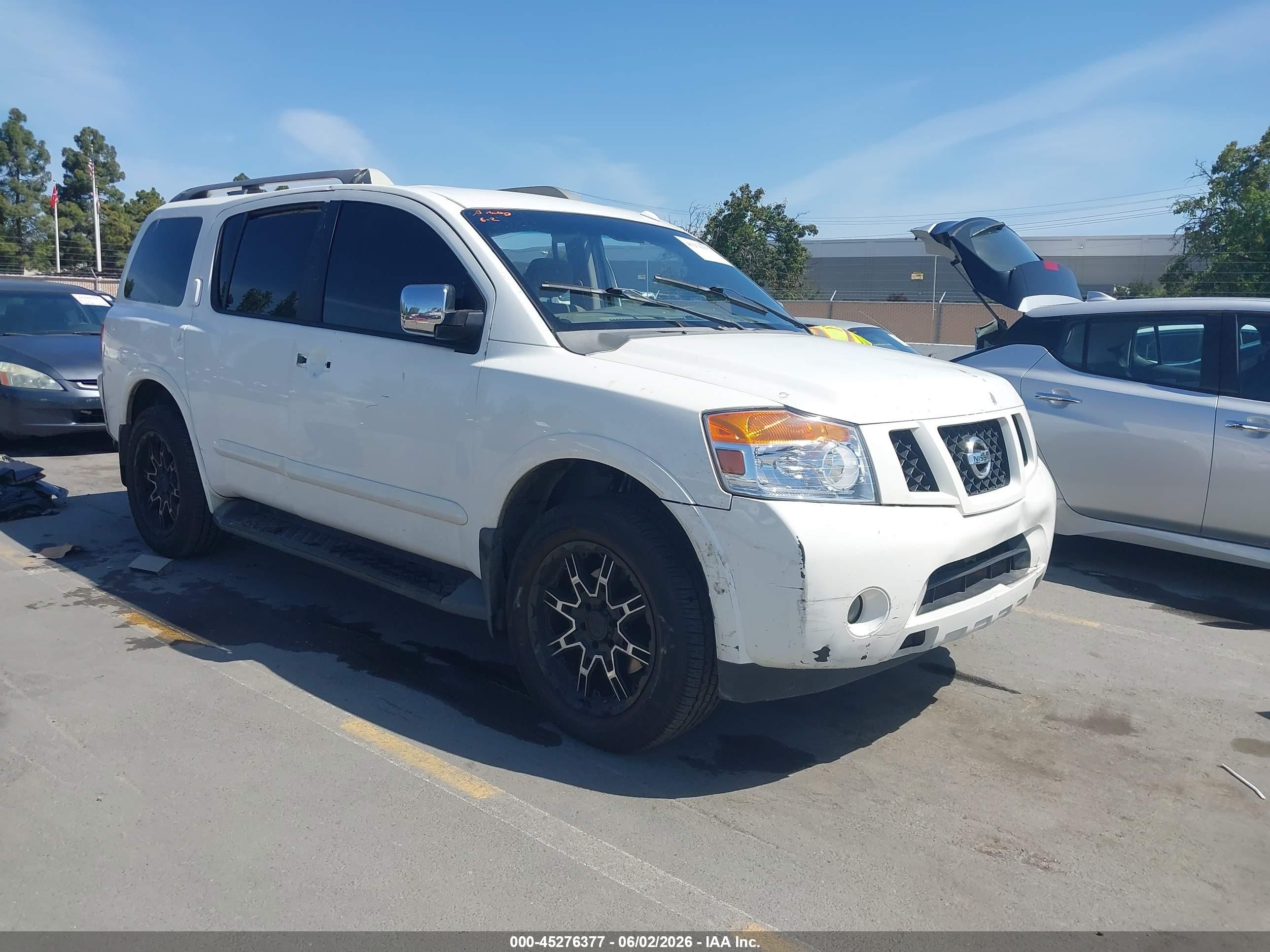 2011 Nissan Armada Platinum, VIN 5N1AA0NC2BN611461 — Side