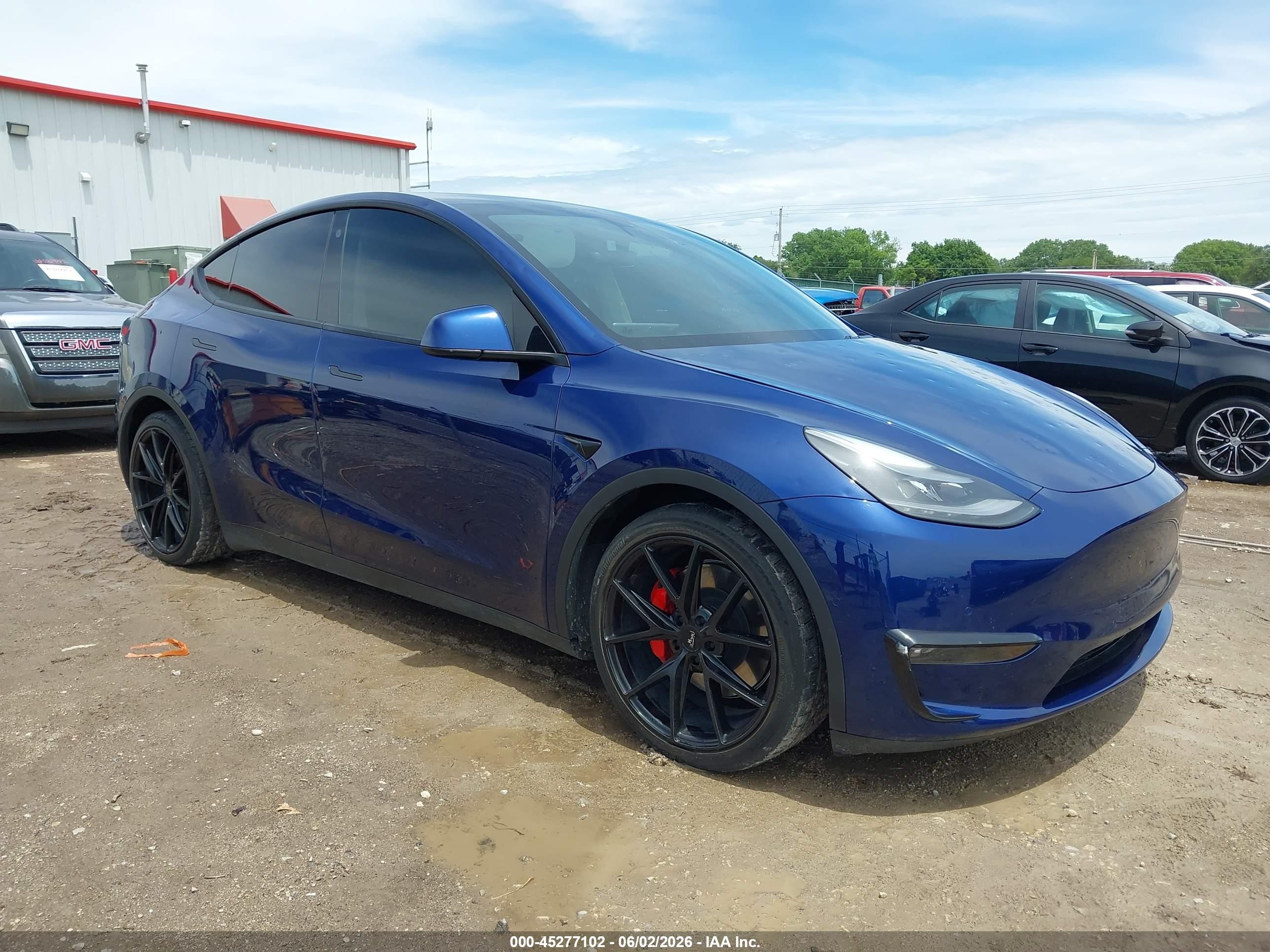 2021 Tesla Model Y Performance, VIN 5YJYGDEF7MF269218 — Hail