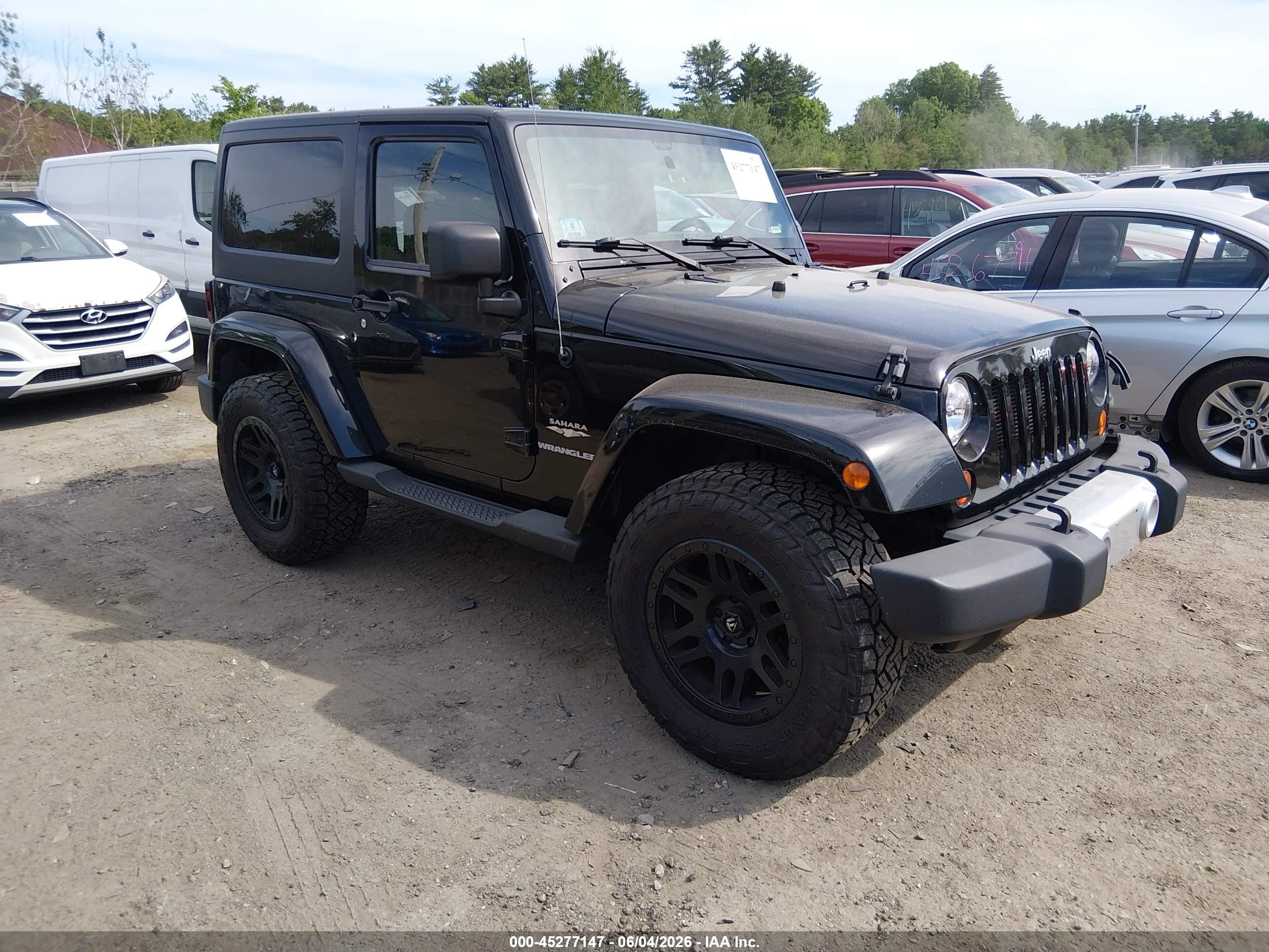 2012 Jeep Wrangler Sahara, VIN 1C4AJWBG6CL176410 — Front end