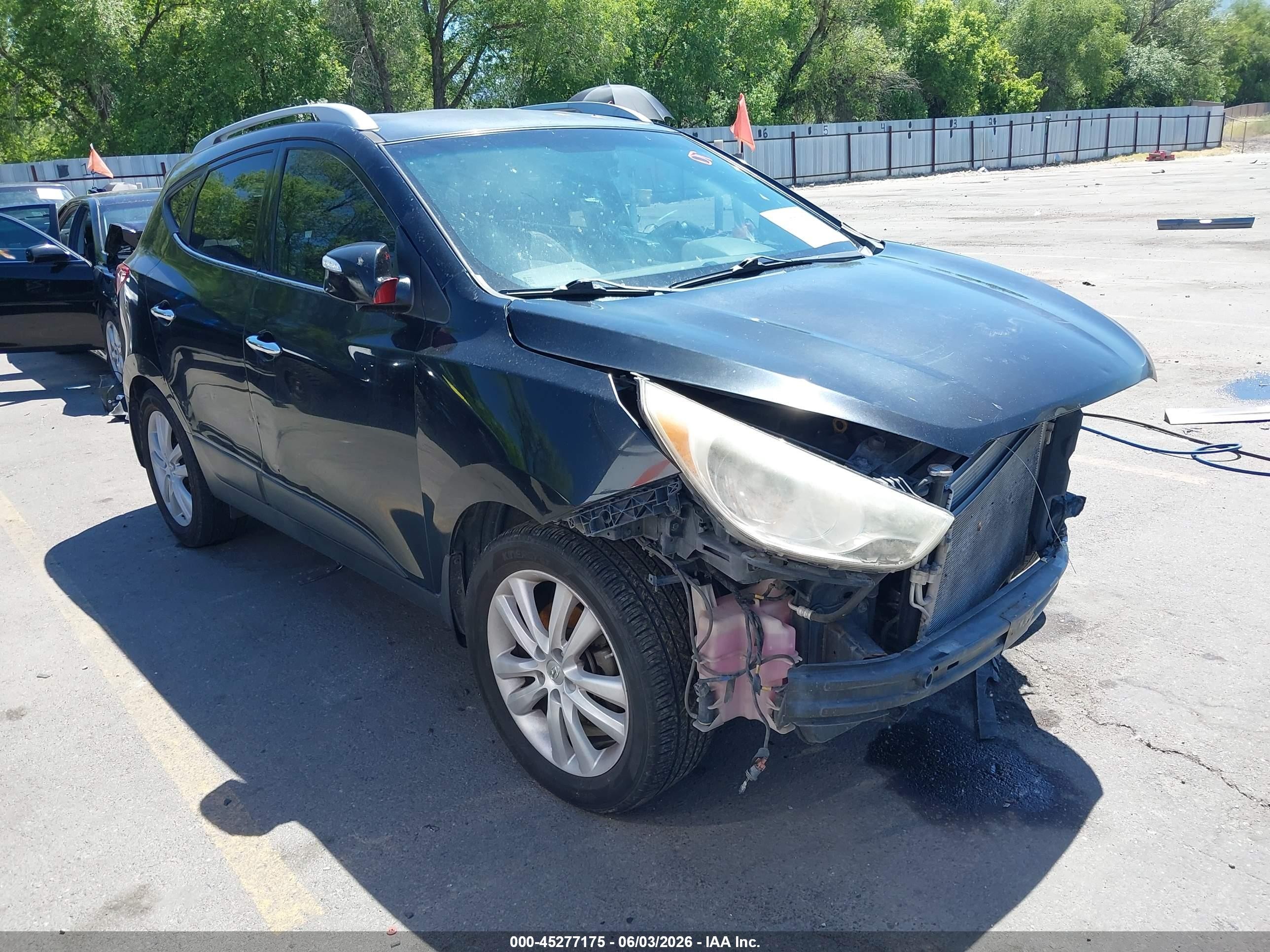 2010 Hyundai Tucson GLS, VIN KM8JUCAC5AU064821 — Front end