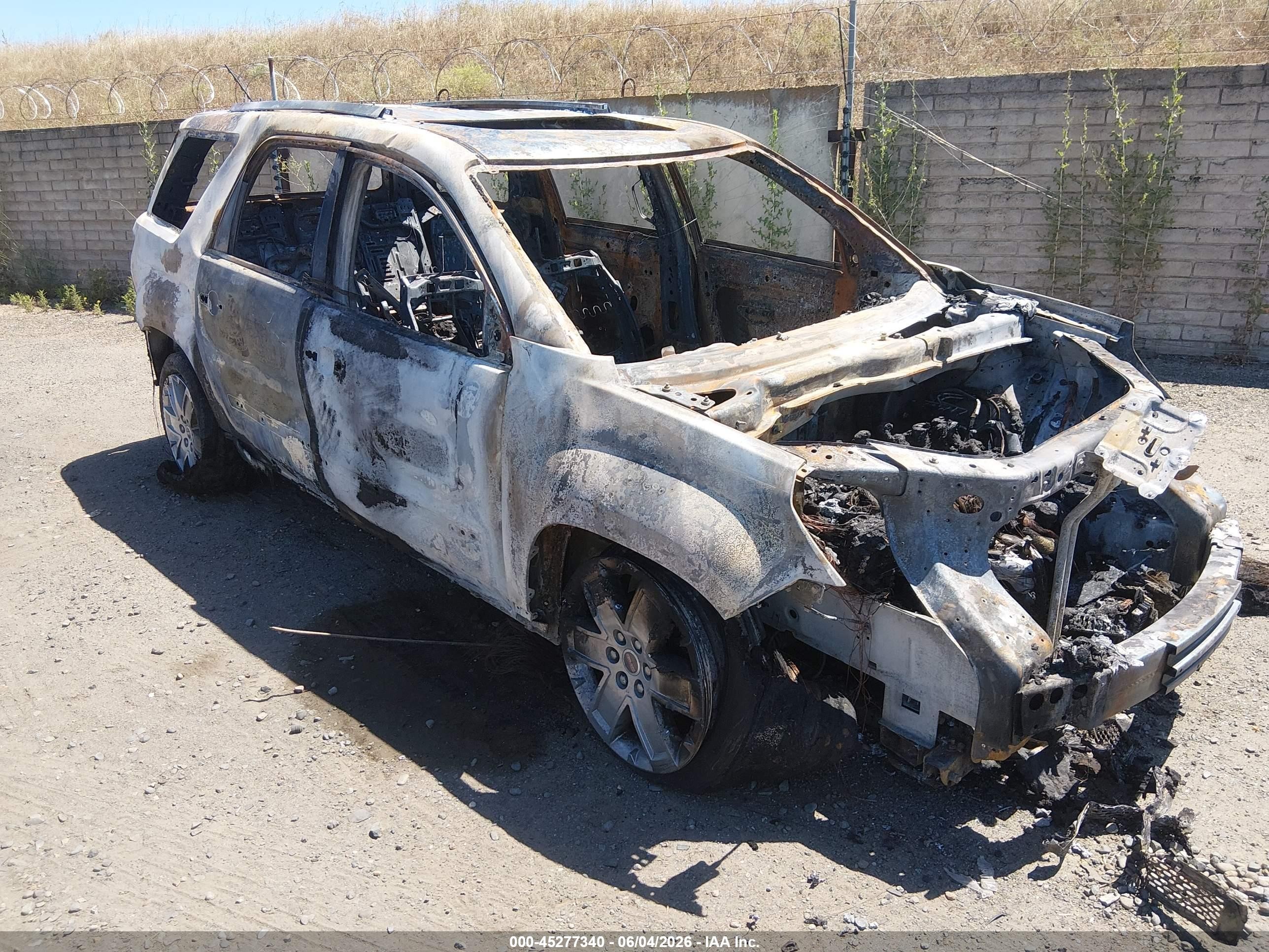 2014 GMC Acadia Denali, VIN 1GKKVTKD4EJ198048 — Theft recovery