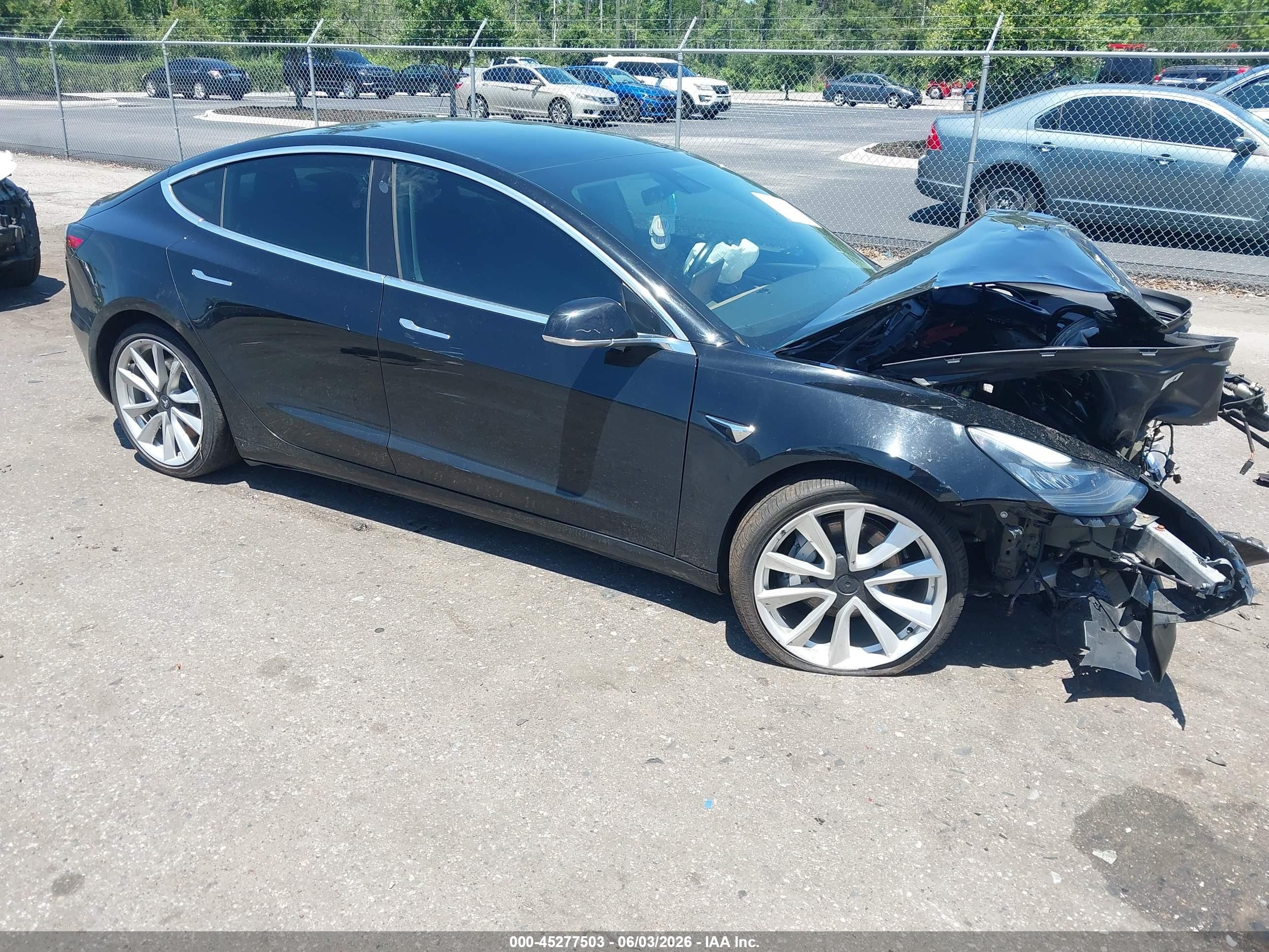2019 Tesla Model 3 Mid Range, VIN 5YJ3E1EA5KF401778 — Not stated