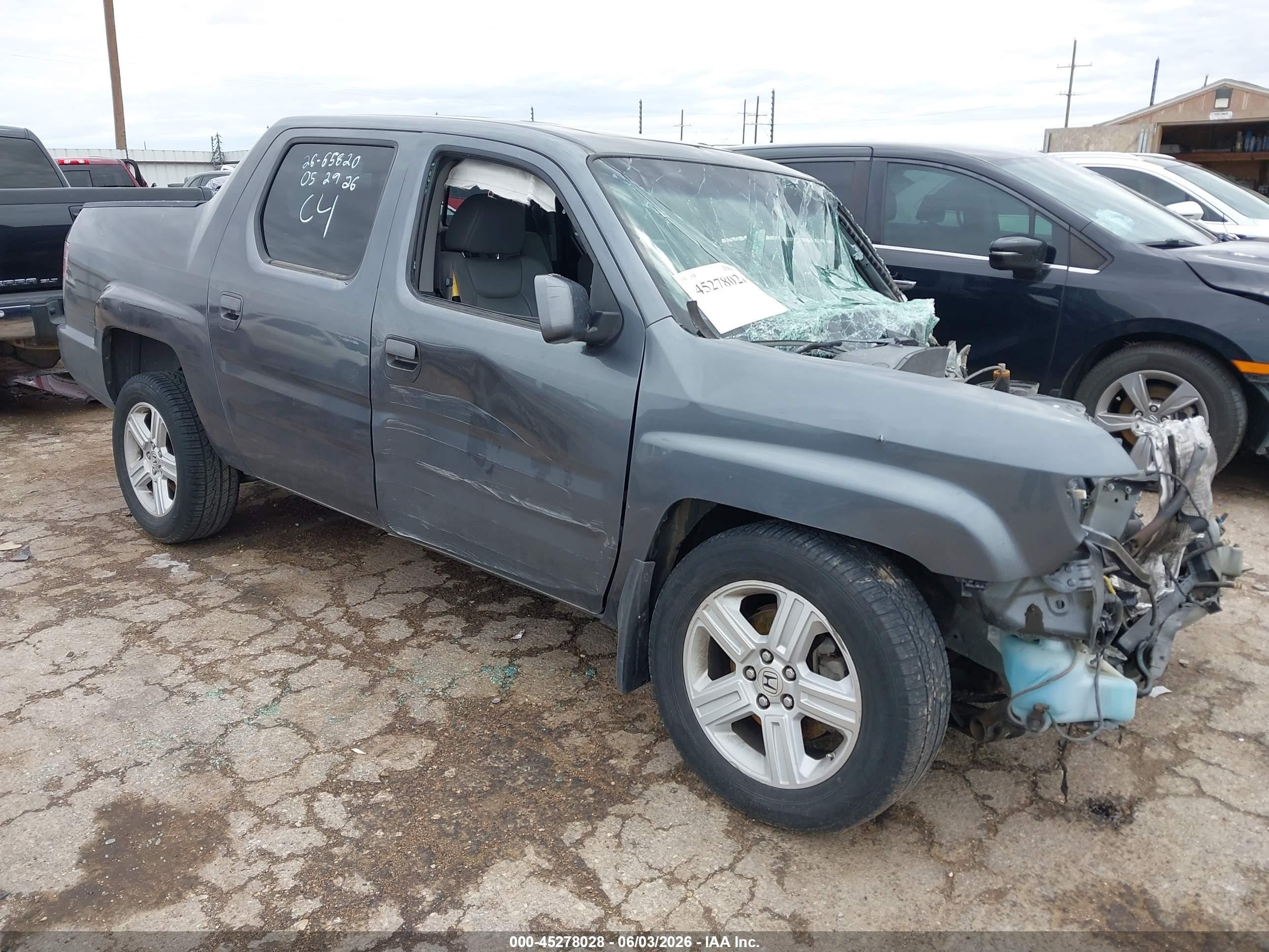 2010 Honda Ridgeline RTL, VIN 5FPYK1F50AB008261 — Front end
