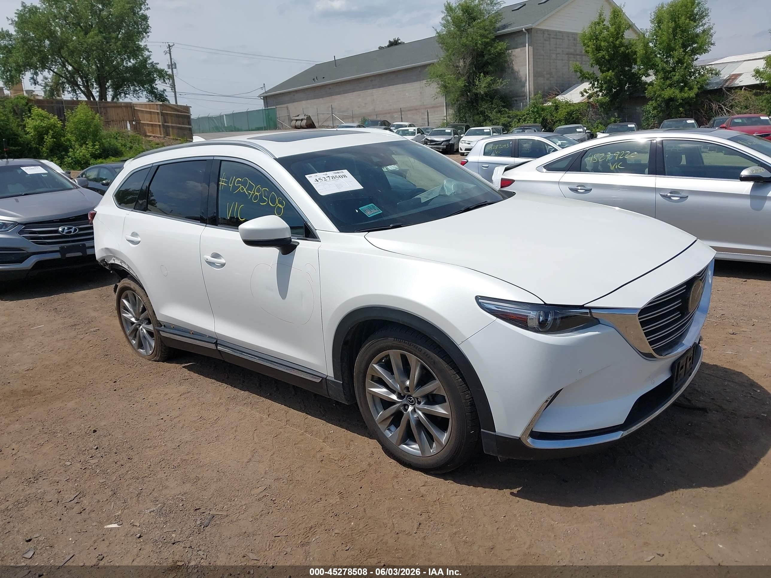 2019 Mazda CX-9 Grand Touring, VIN JM3TCBDY0K0309879 — Зад
