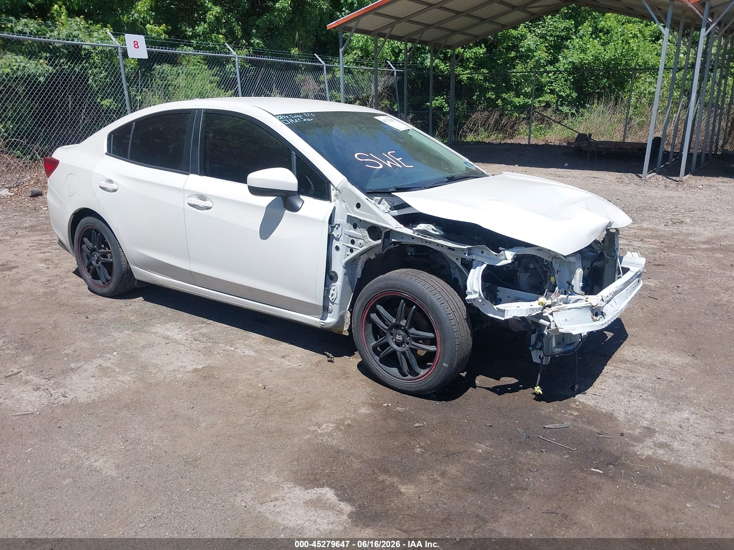 2017 Subaru Impreza Premium, VIN 4S3GKAB69H3616015 — Side