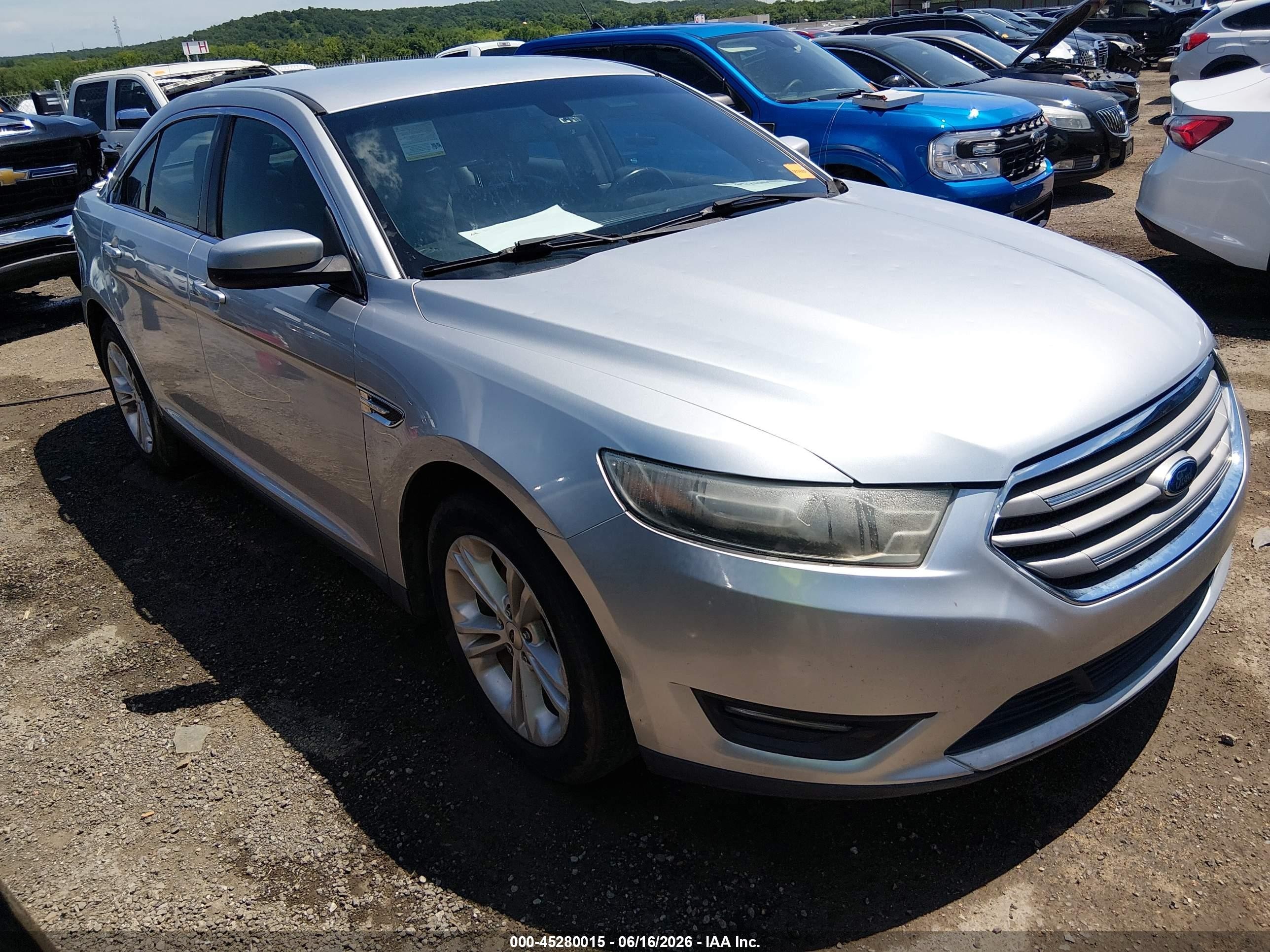 2015 Ford Taurus SEL, VIN 1FAHP2E87FG181757 — Hail