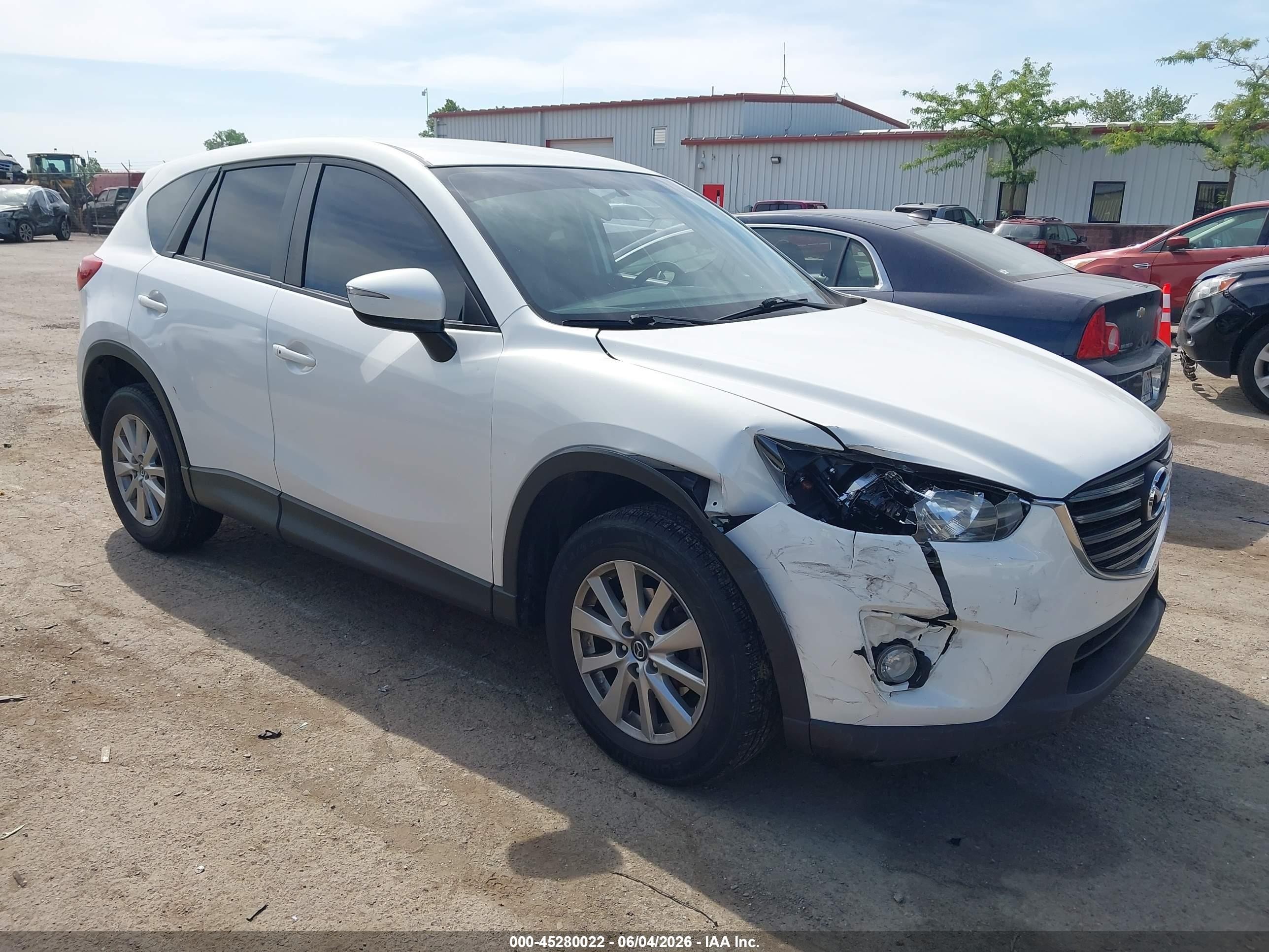 2016 Mazda CX-5 Touring, VIN JM3KE4CY5G0914765 — Front end