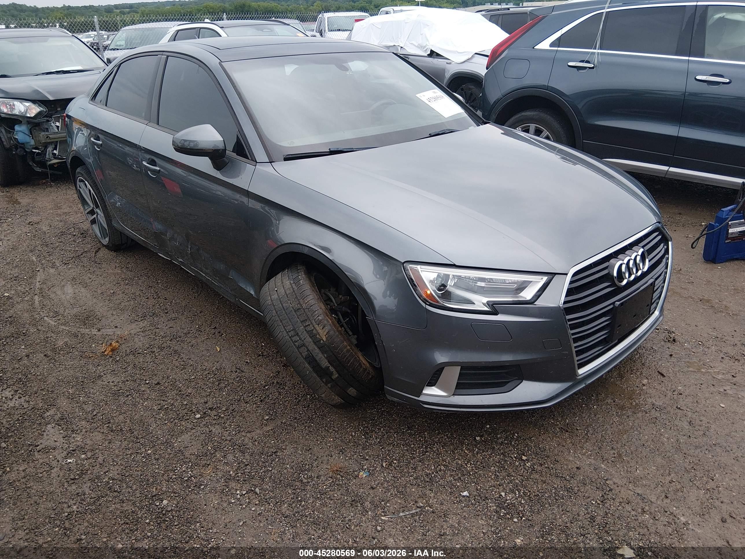 2018 Audi A3 Premium, VIN WAUAUGFF8J1022284 — Side