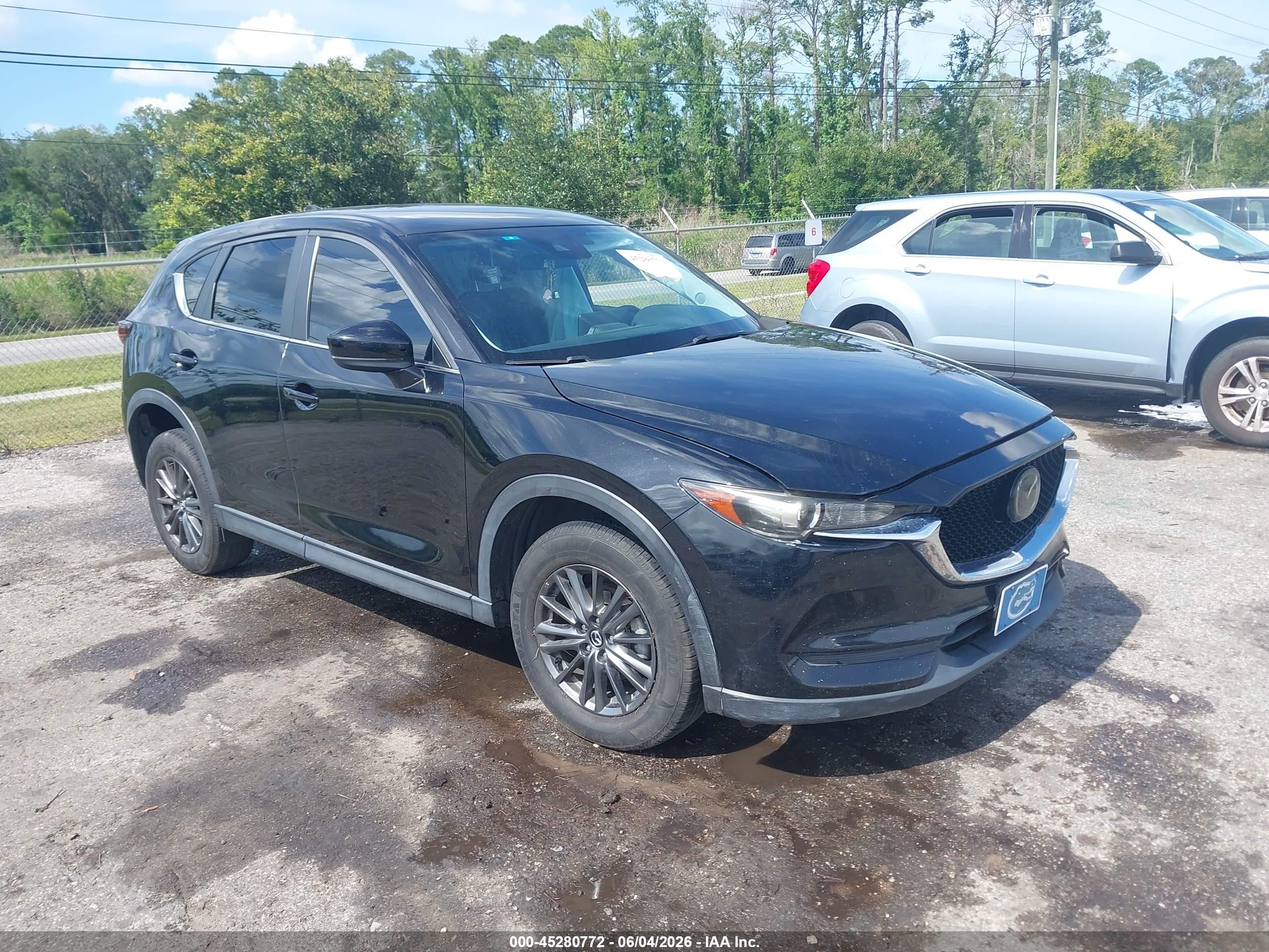 2021 Mazda CX-5 Touring, VIN JM3KFBCM4M1329115 — Side