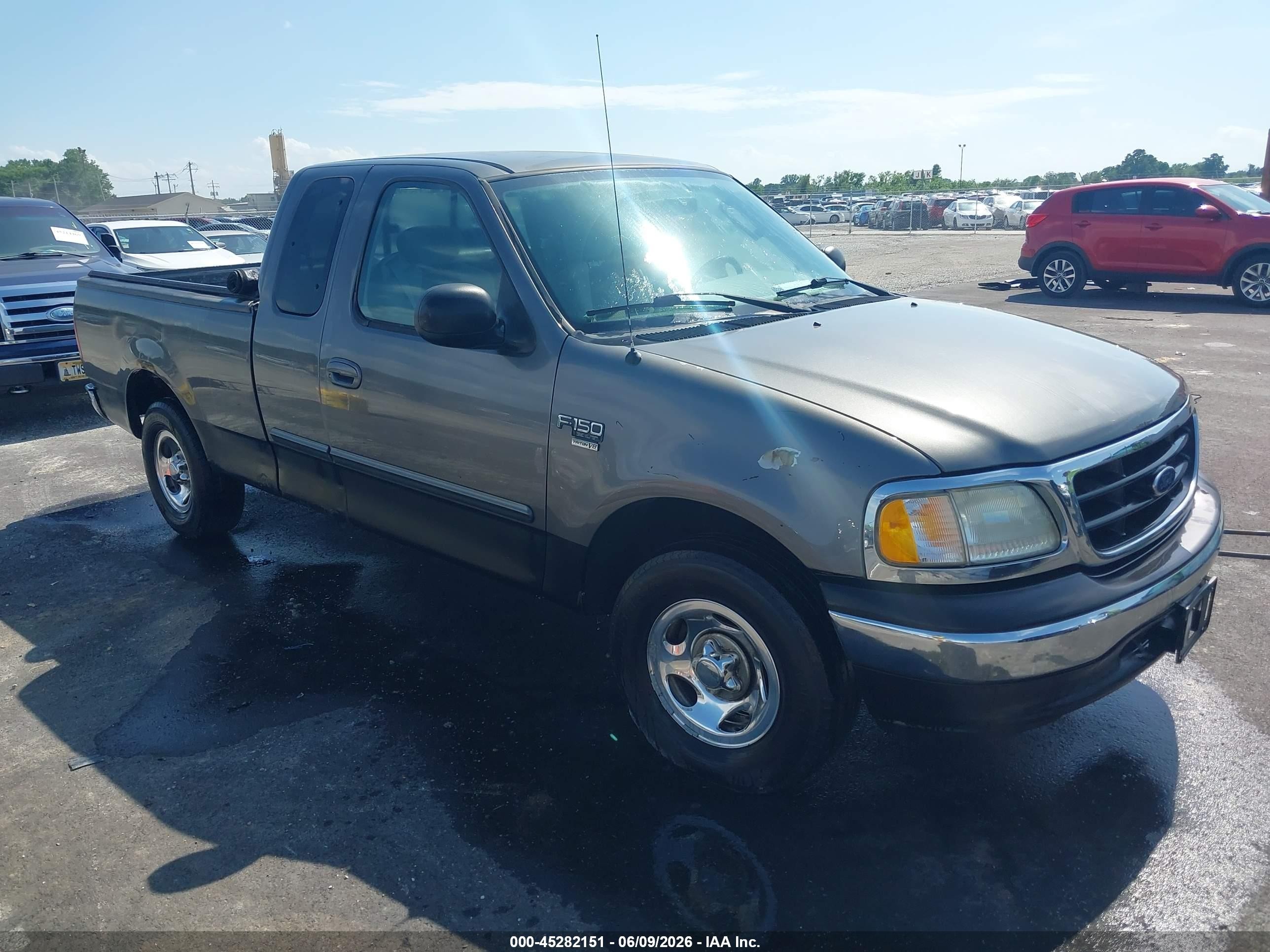 2003 Ford F-150 XL, VIN 2FTRX17W03CA42734 — Side