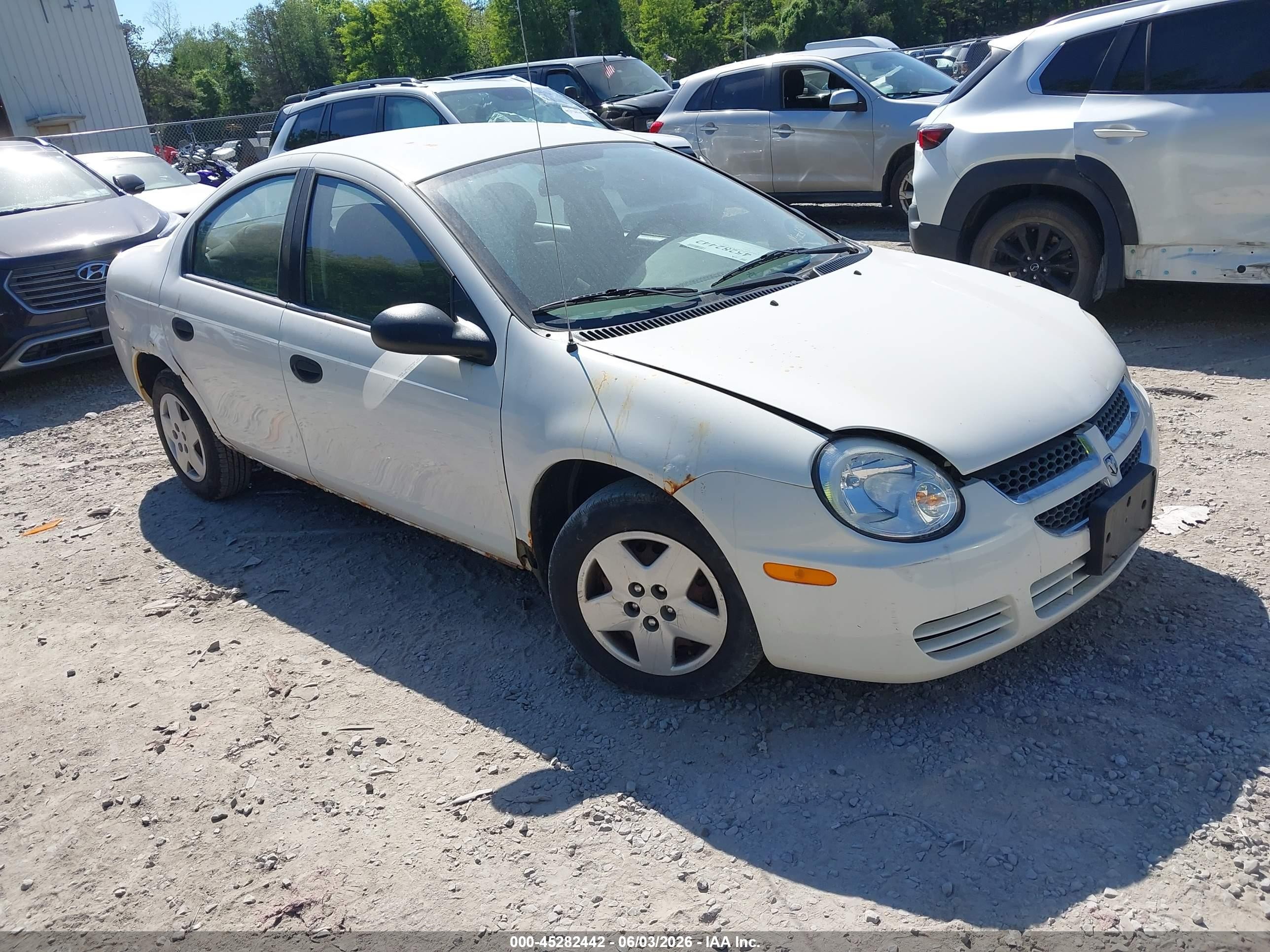 2004 Dodge Neon SE, VIN 1B3ES26C54D643909 — Normal wear