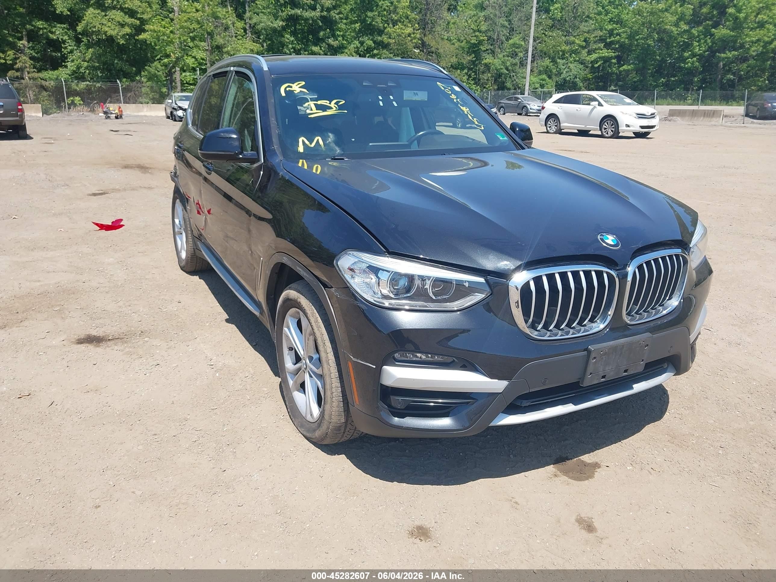 2021 BMW X3 xDrive30i, VIN 5UXTY5C09M9D82143 — Side