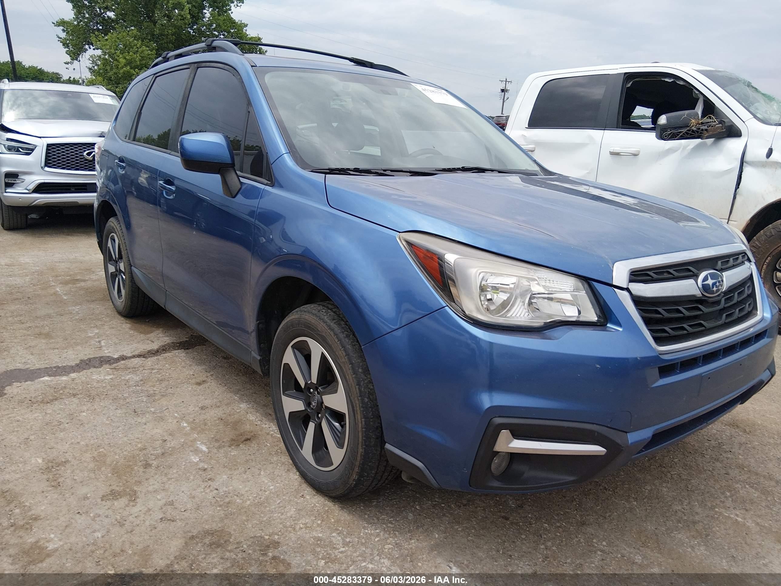 2018 Subaru Forester Premium, VIN JF2SJAGCXJH416296 — Hail