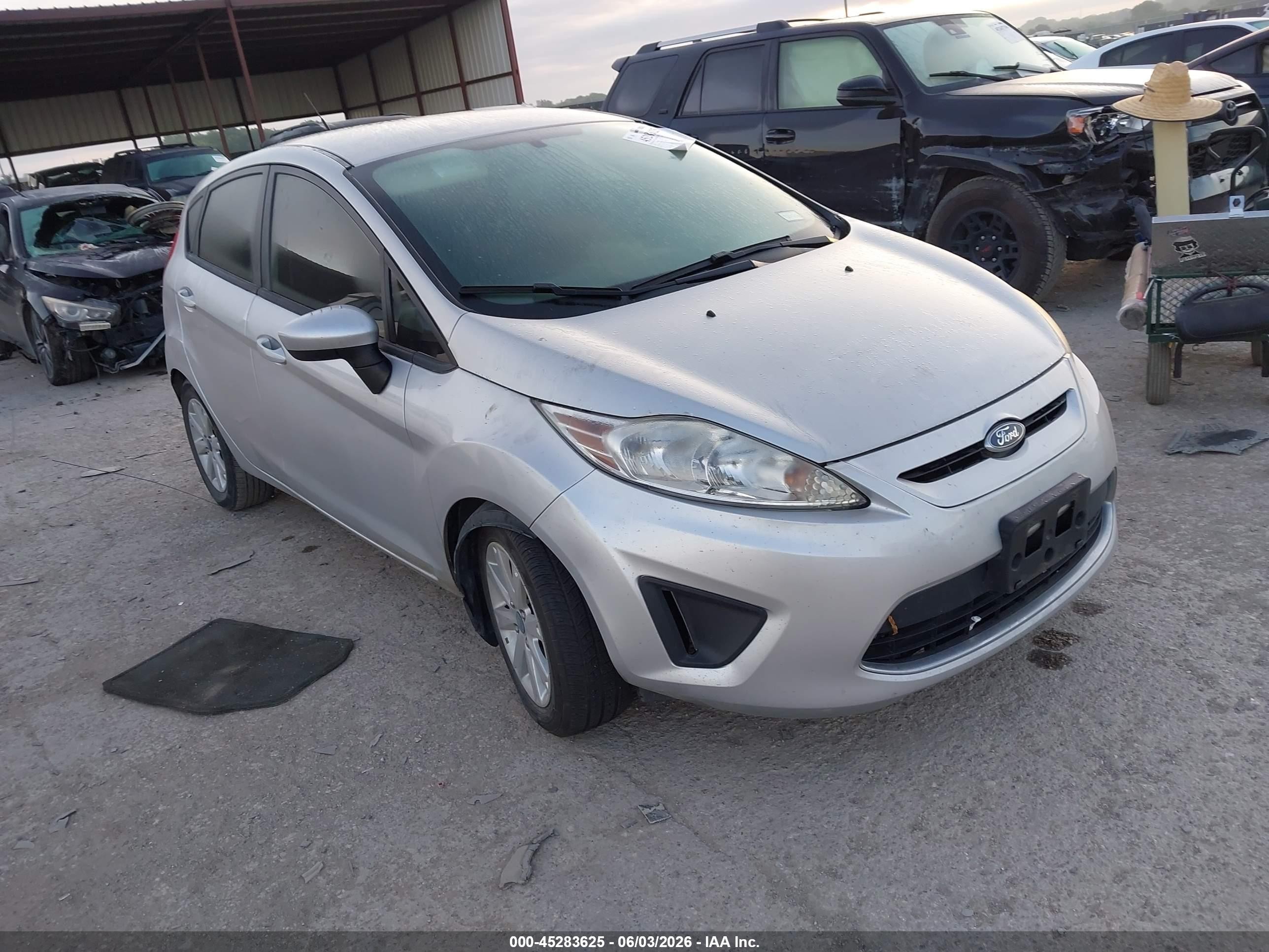 2012 Ford Fiesta SE, VIN 3FADP4EJ9CM106928 — Вода / потоп