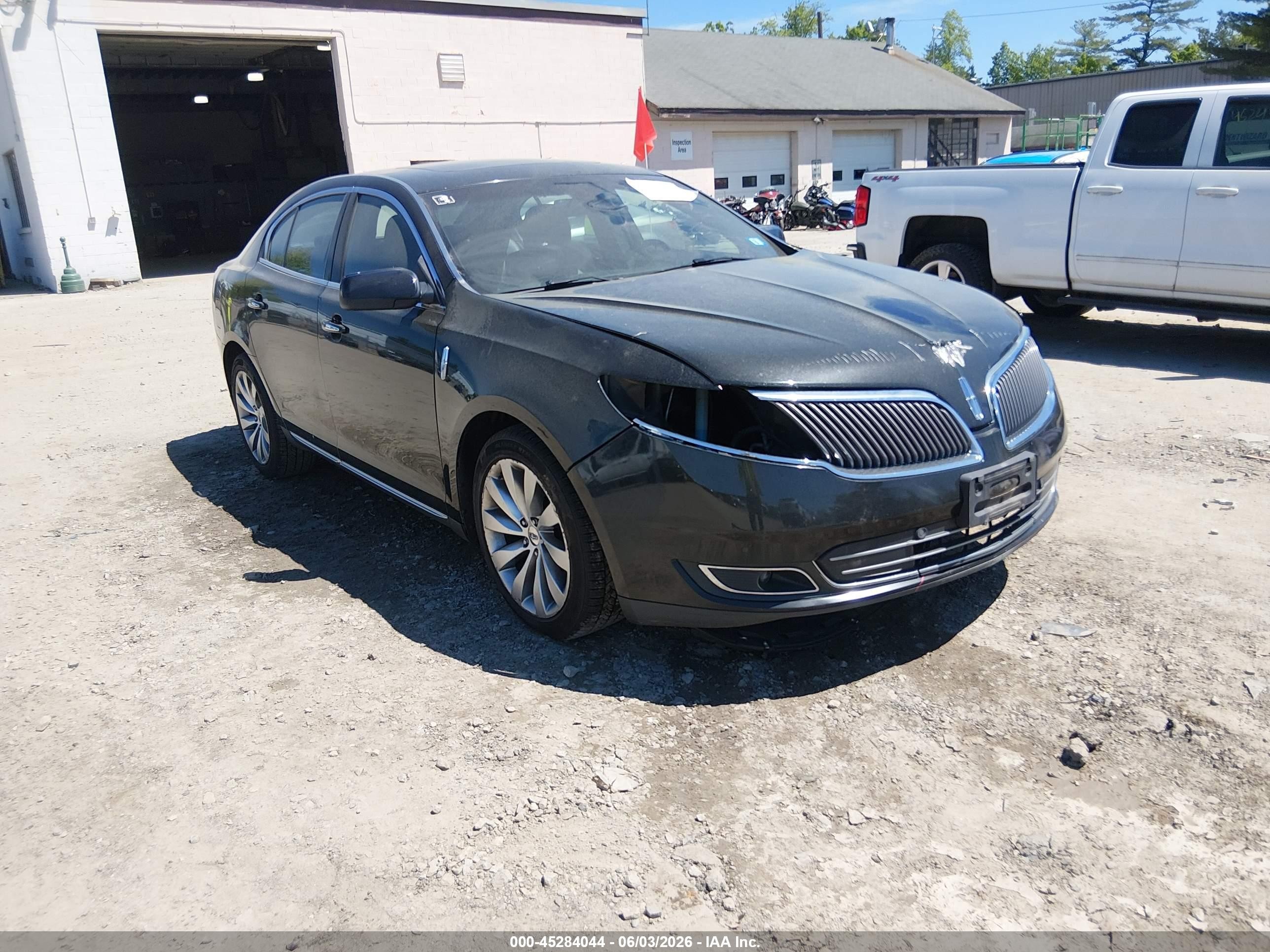 2015 Lincoln MKS, VIN 1LNHL9EK3FG603142 — Front end