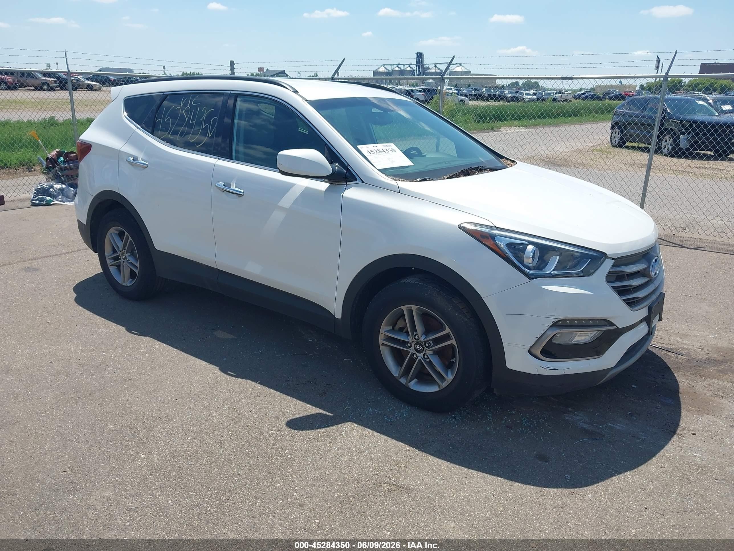2017 Hyundai Santa Fe 2.4L, VIN 5XYZUDLB7HG417296 — Rear end