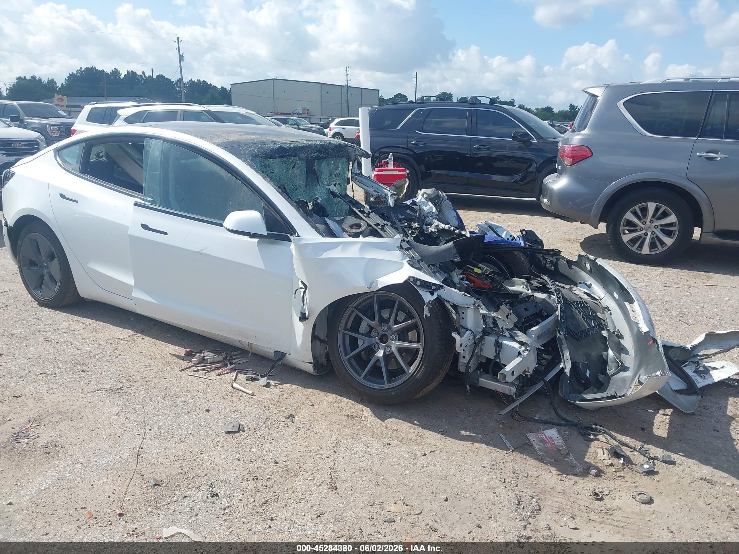 2022 Tesla Model 3 Long Range, VIN 5YJ3E1EB0NF341082 — Rollover