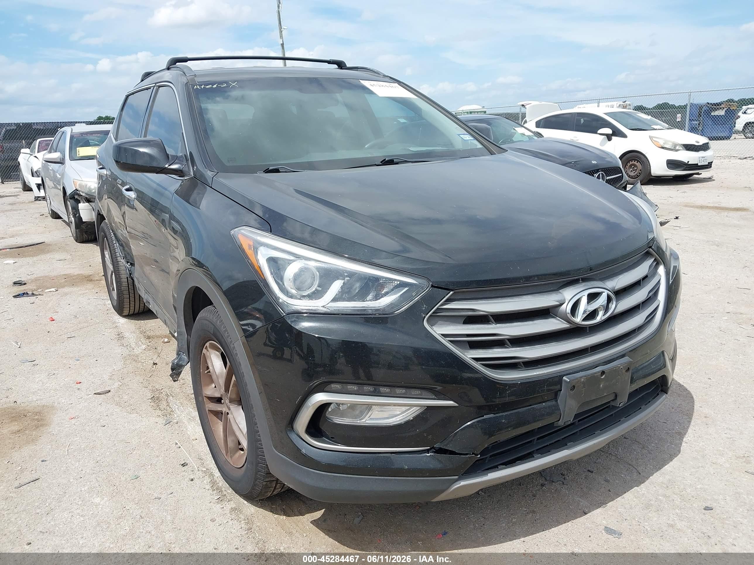 2017 Hyundai Santa Fe 2.4L, VIN 5XYZU3LB2HG400934 — Side