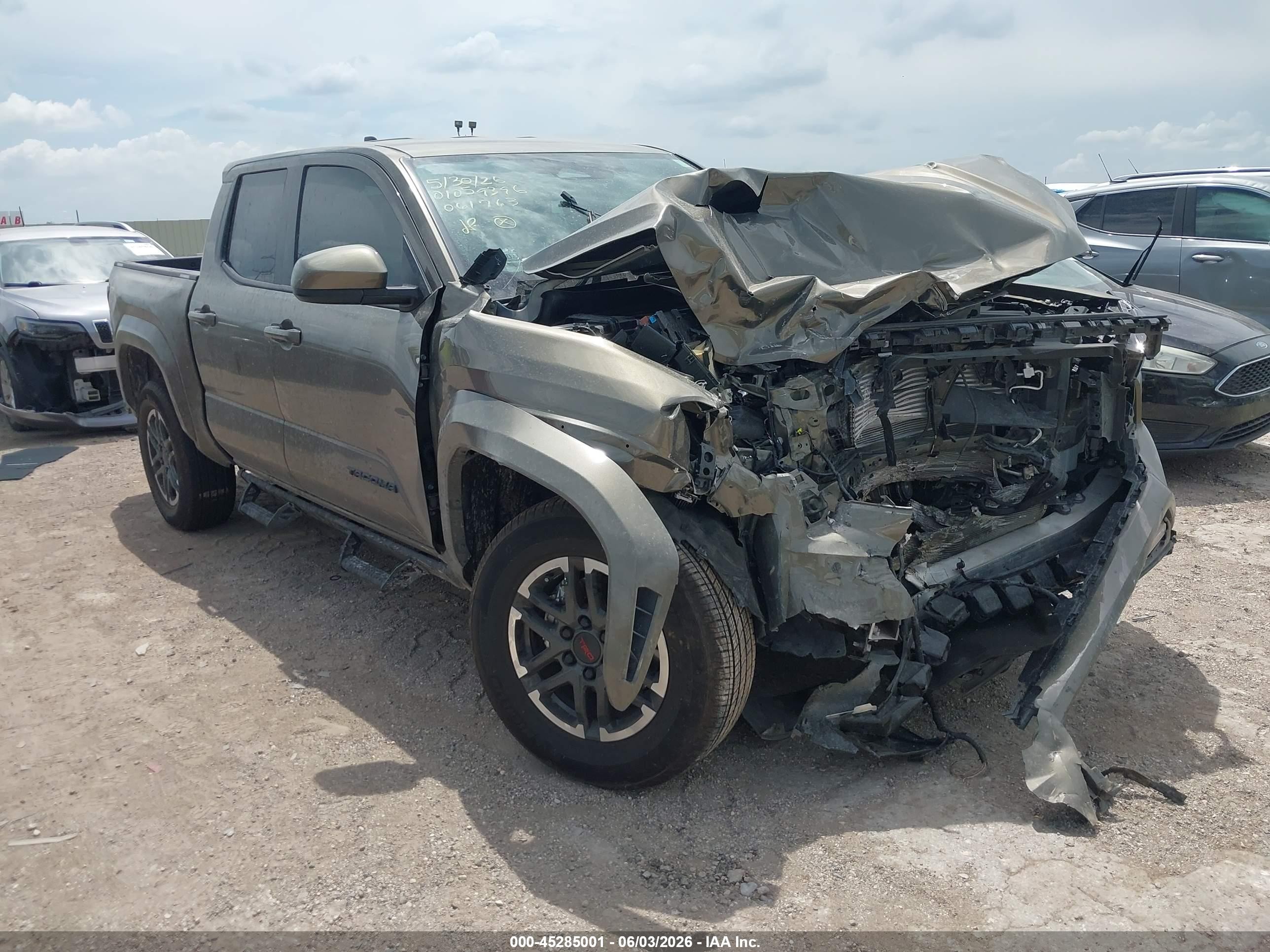 2026 Toyota Tacoma SR5, VIN 3TMKB5FN8TM061763 — Front end