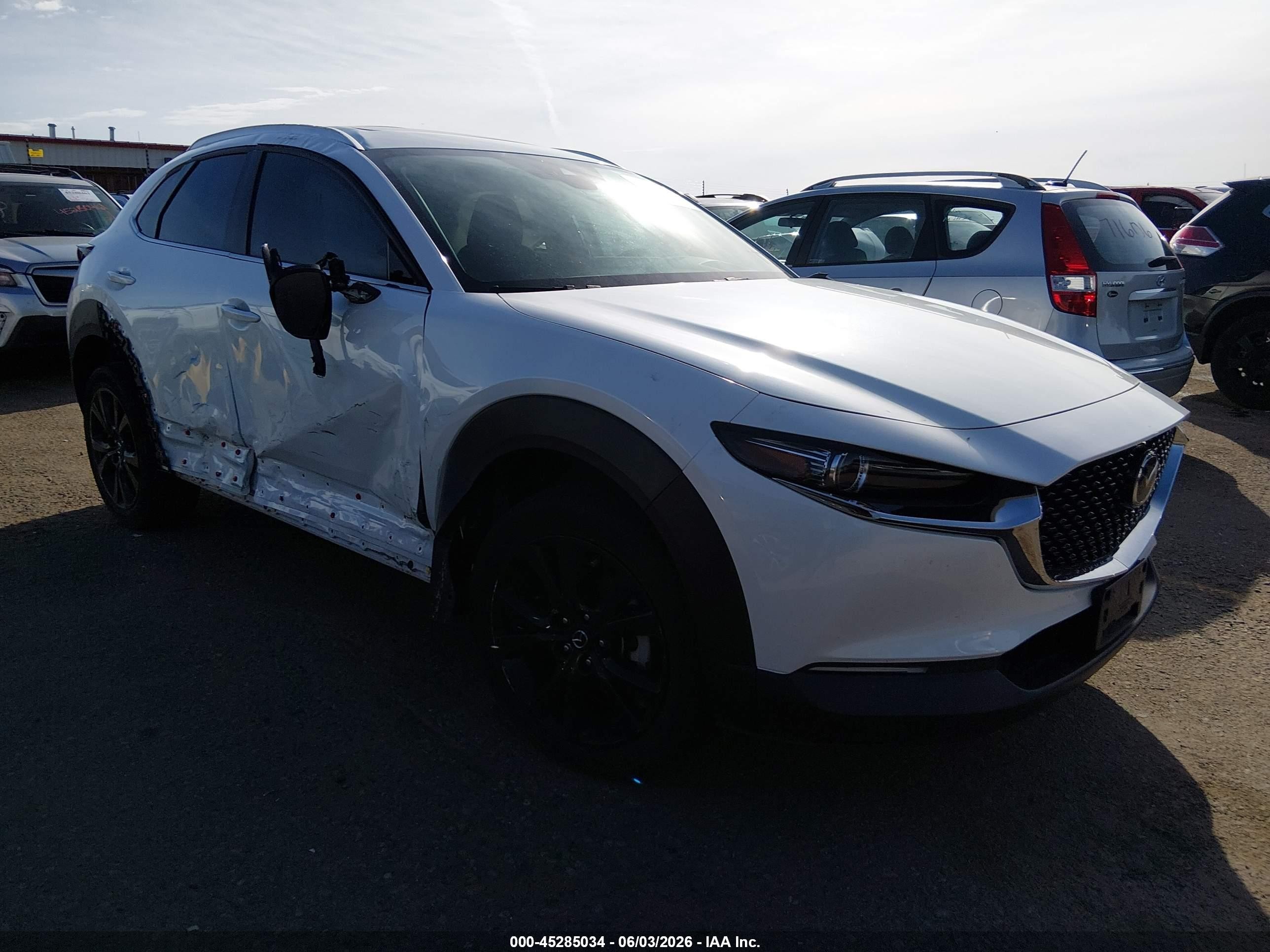 2022 Mazda CX-30 Premium, VIN 3MVDMBDY1NM411928 — Side