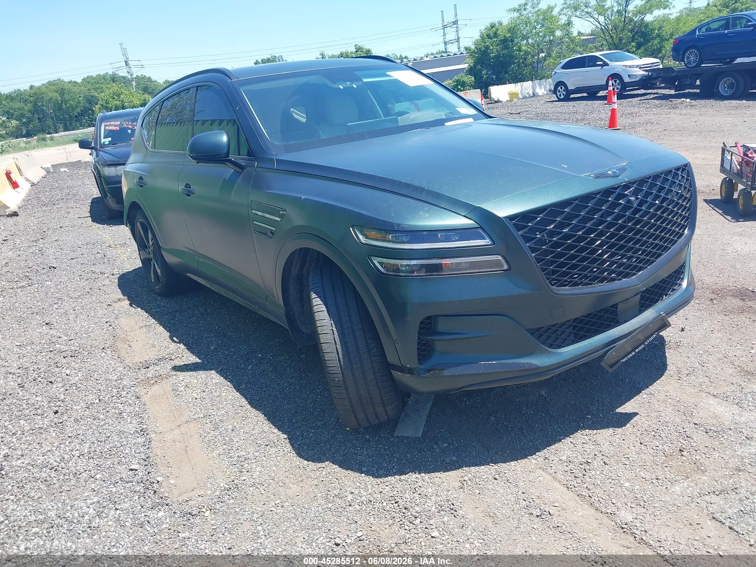 2023 Genesis GV80 Advanced Plus, VIN KMUHCESCXPU127143 — Side