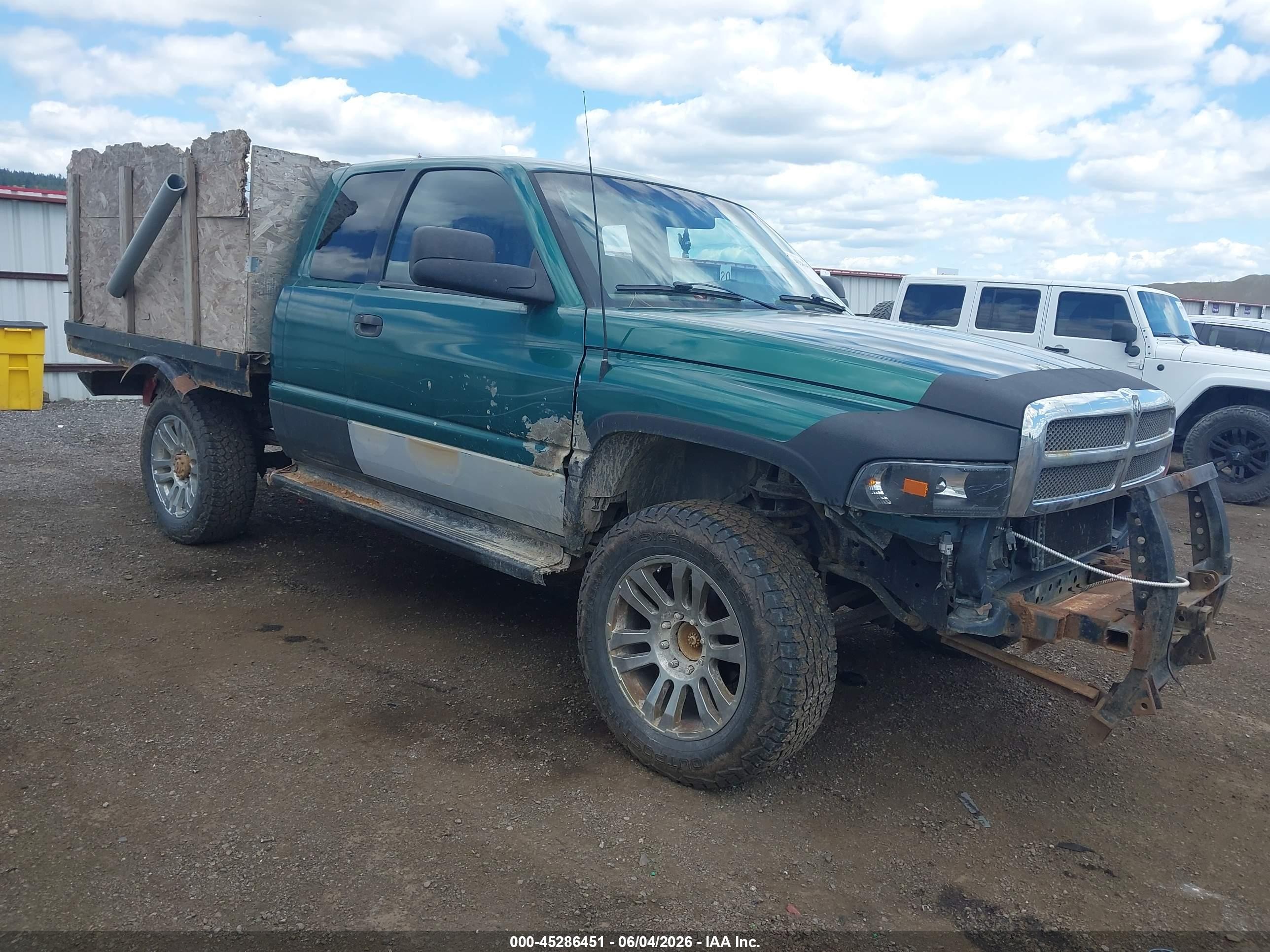 1999 Dodge 2500, VIN 3B7KF23Z8XG108269 — Side