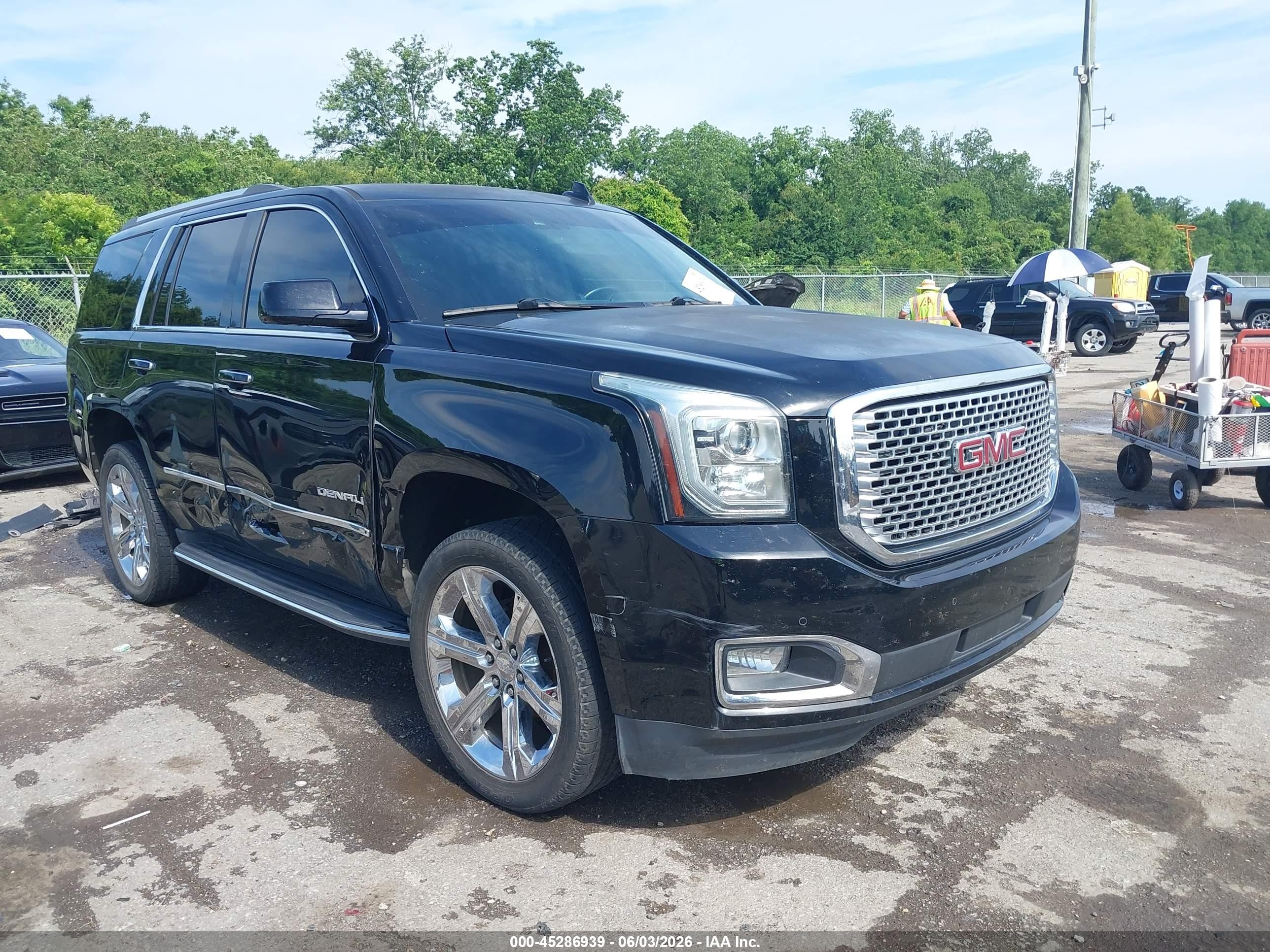 2017 GMC Yukon Denali, VIN 1GKS1CKJ4HR188157 — Side
