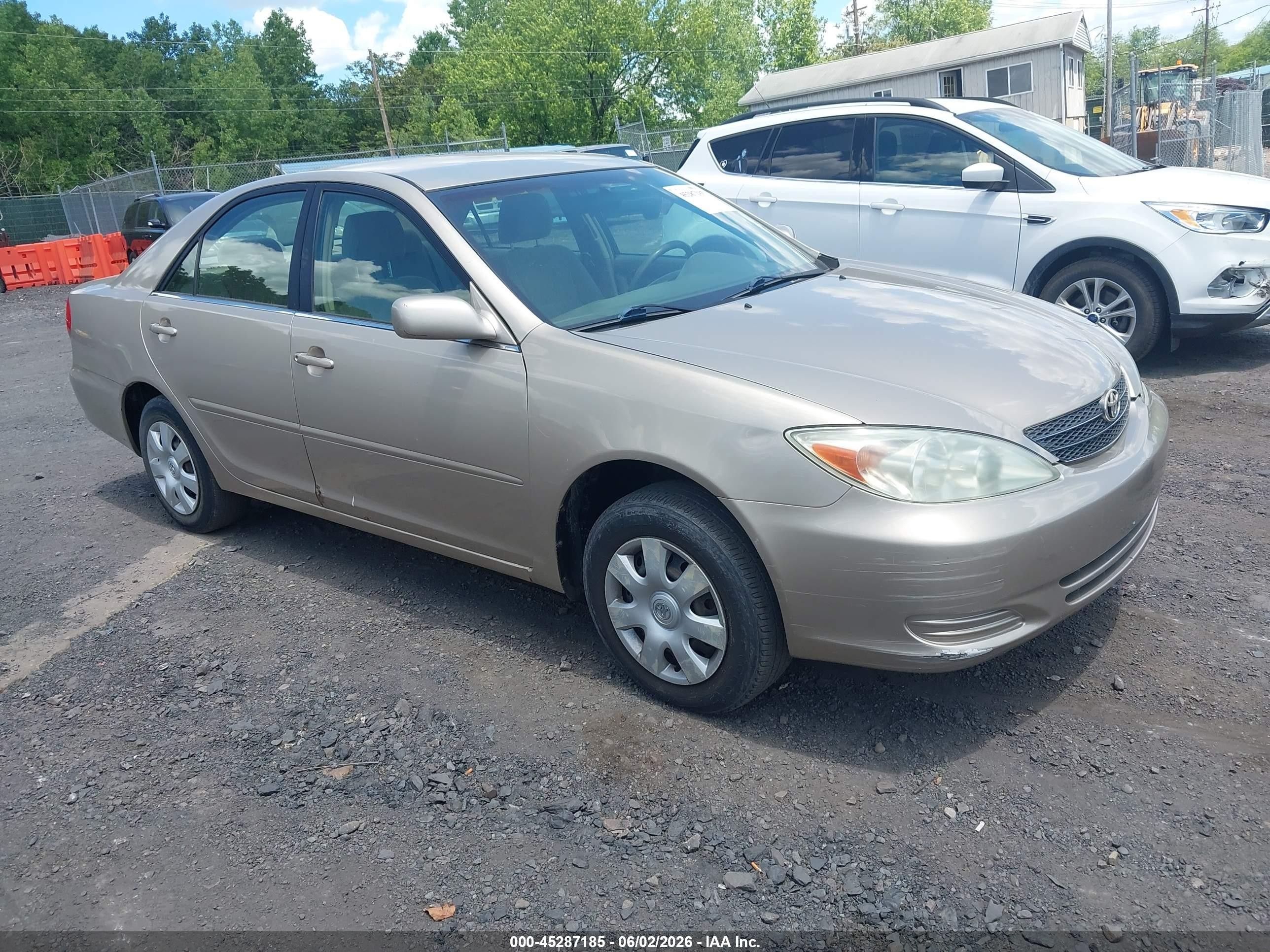 2004 Toyota Camry LE, VIN 4T1BE32KX4U852408 — Not stated