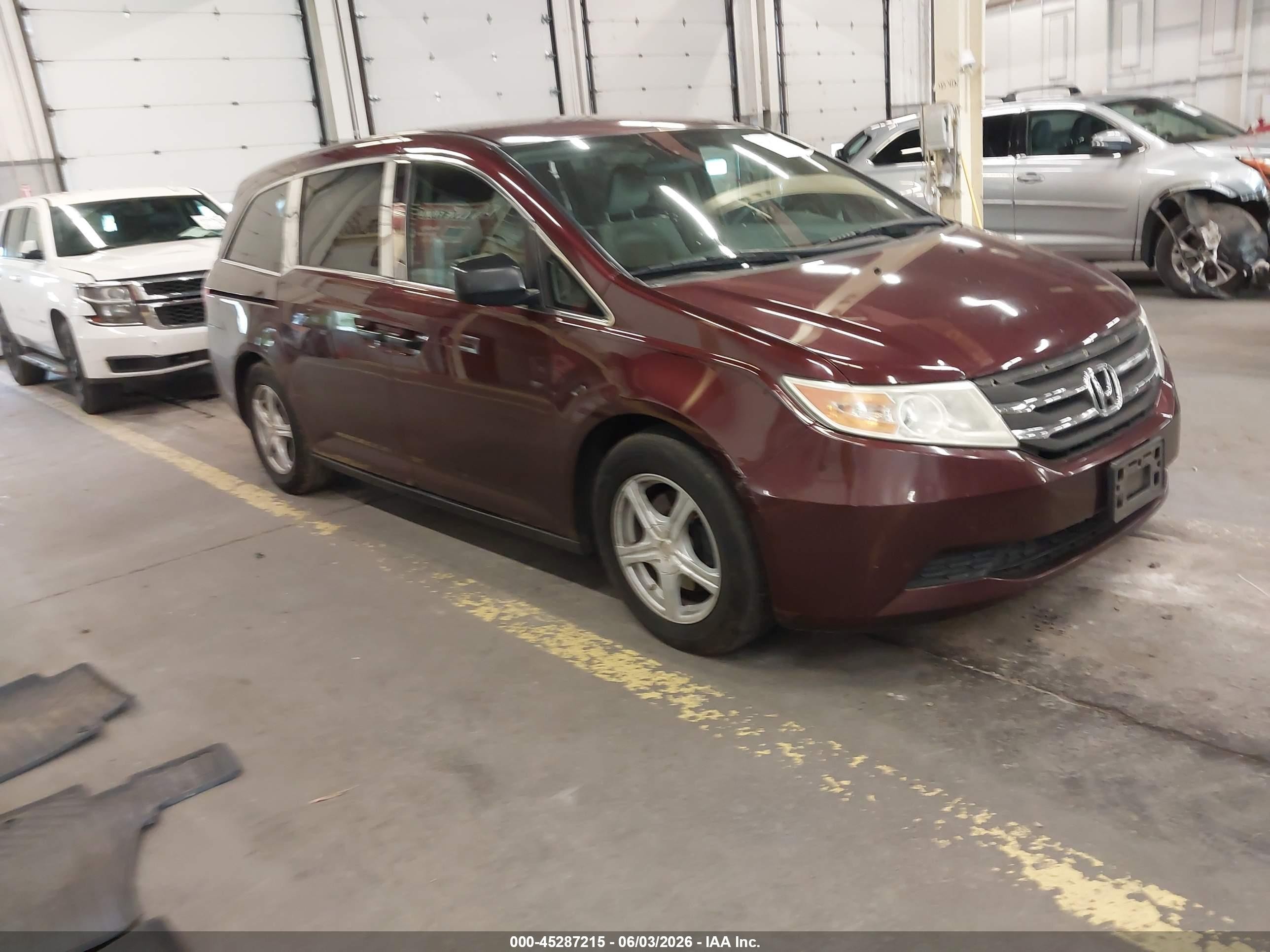 2013 Honda Odyssey LX, VIN 5FNRL5H25DB038574 — Side