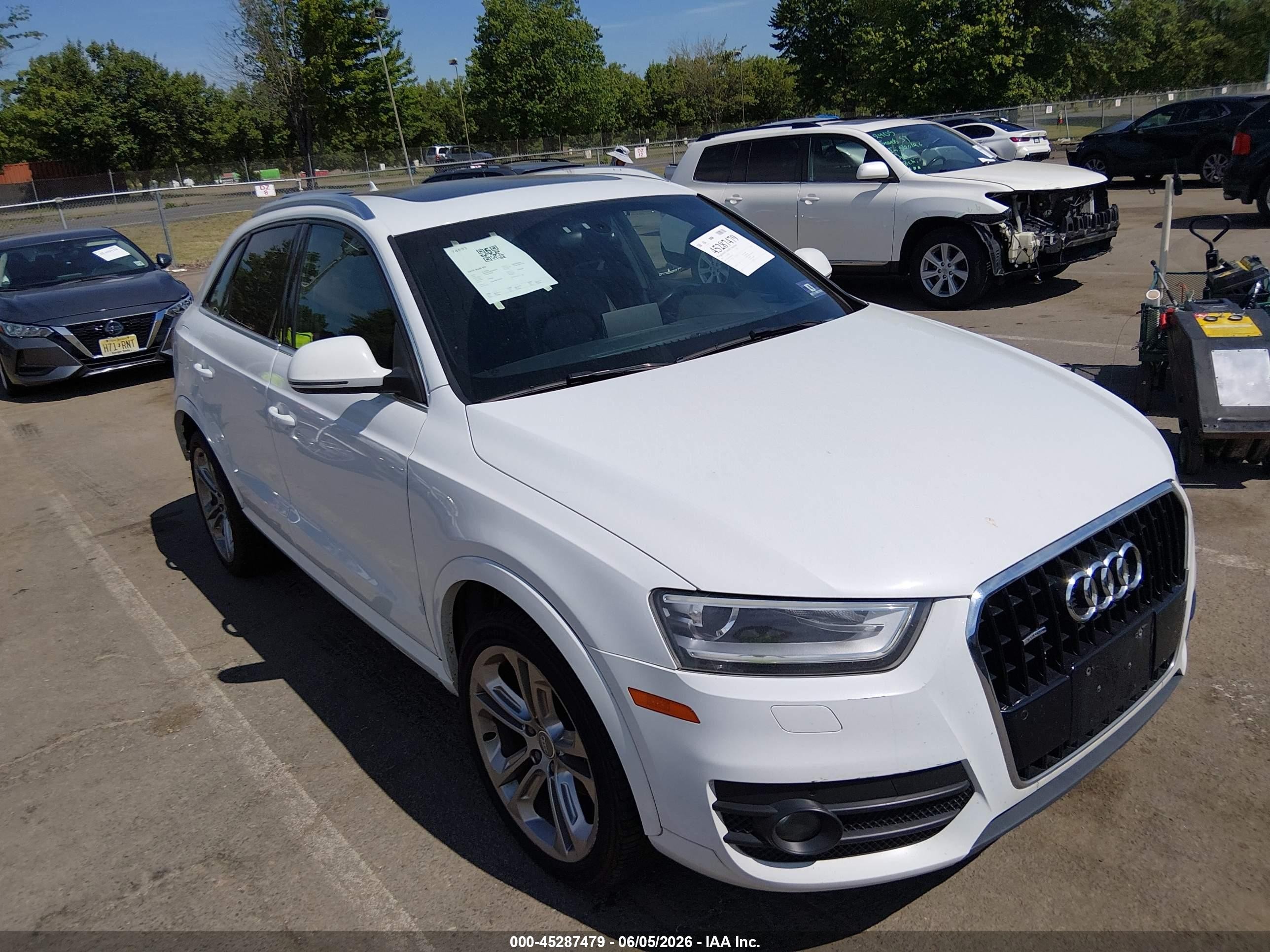 2015 Audi Q3 Prestige, VIN WA1GFCFS6FR003832 — Rear end
