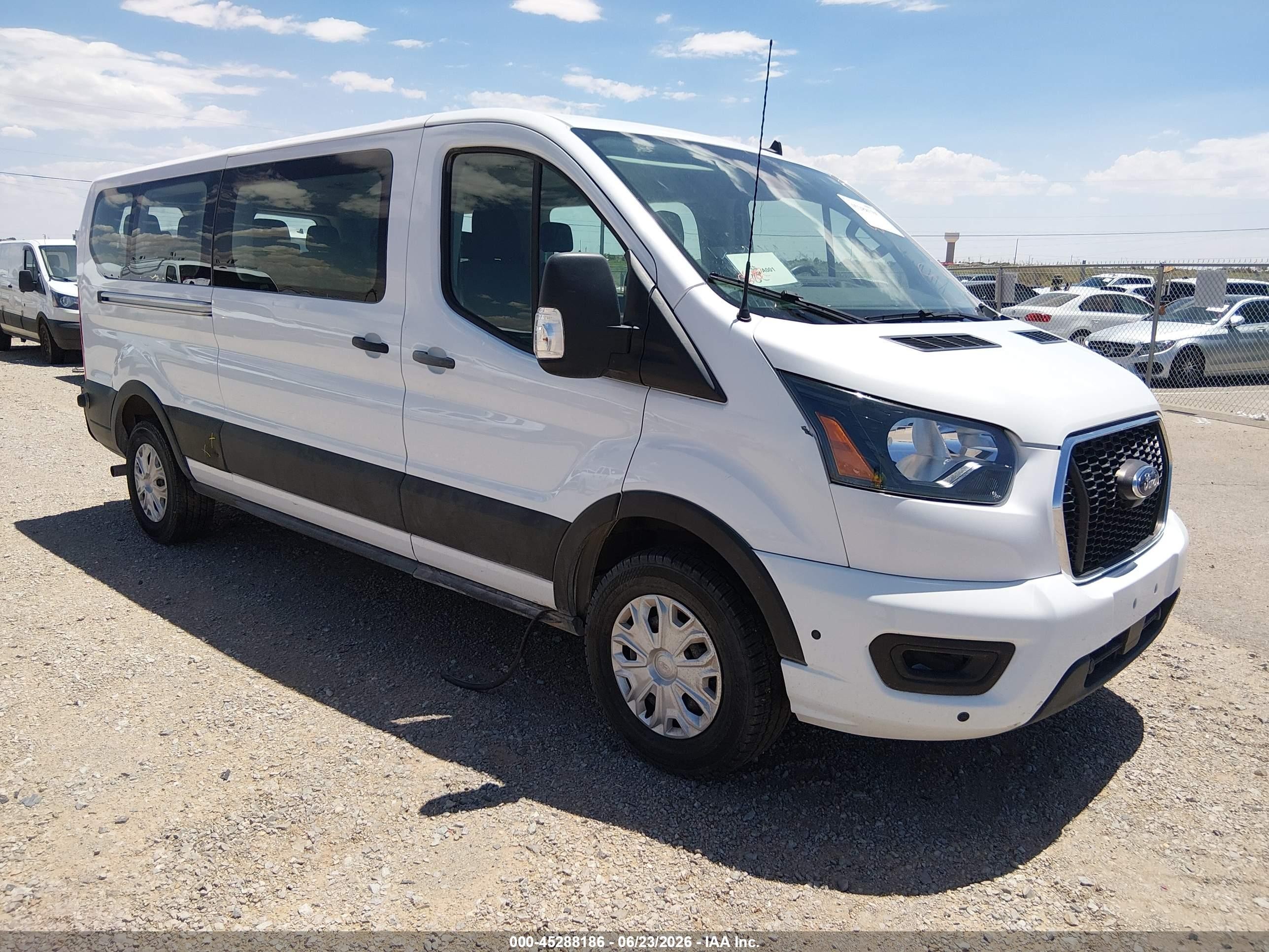 2024 Ford Transit Passenger XLT, VIN 1FBAX2Y81RKA73342 — Rear end
