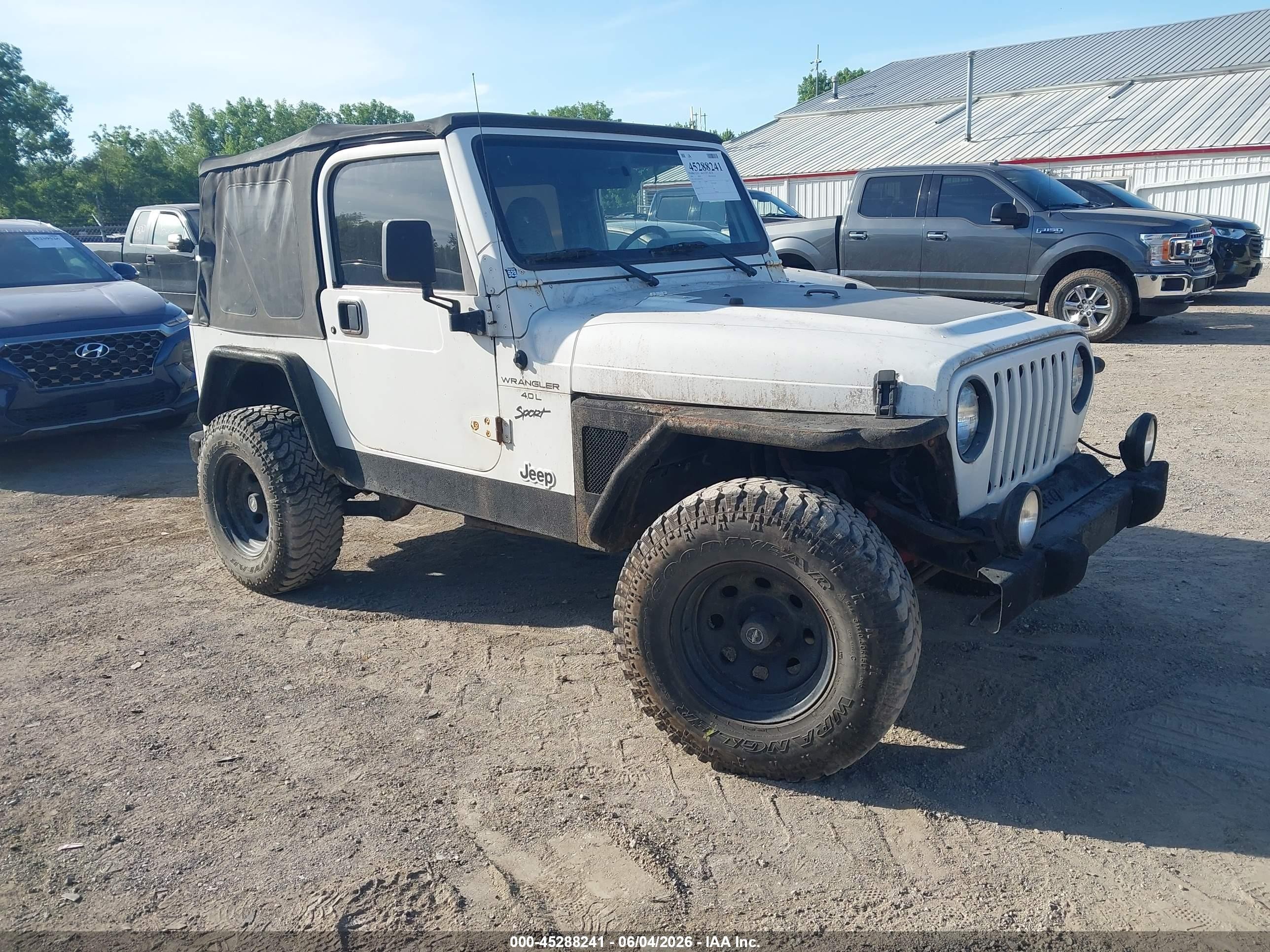1999 Jeep Wrangler Sport, VIN 1J4FY19S8XP472035 — Normal wear