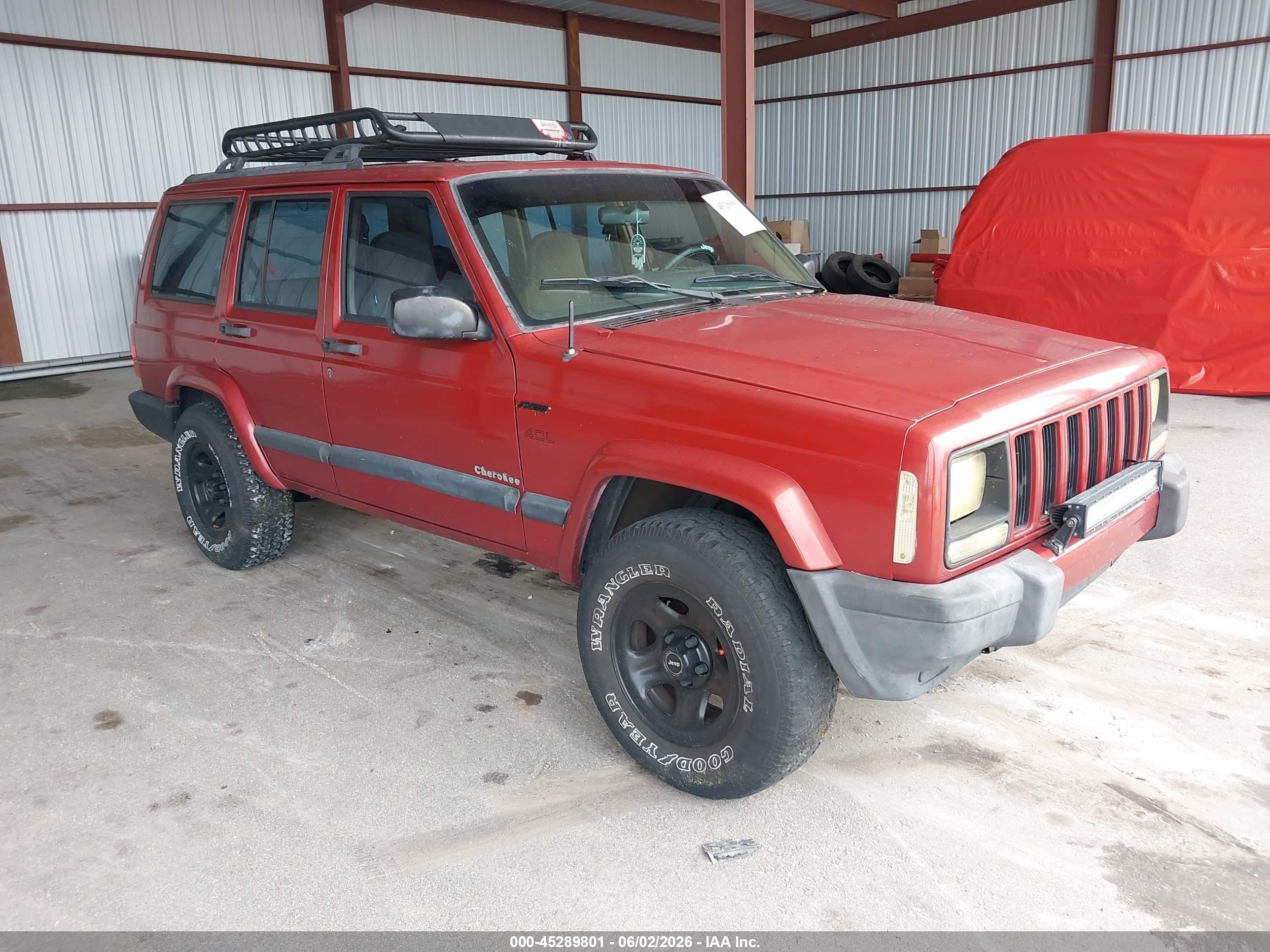 1999 Jeep Cherokee Sport, VIN 1J4FT68S7XL540216 — Normal wear