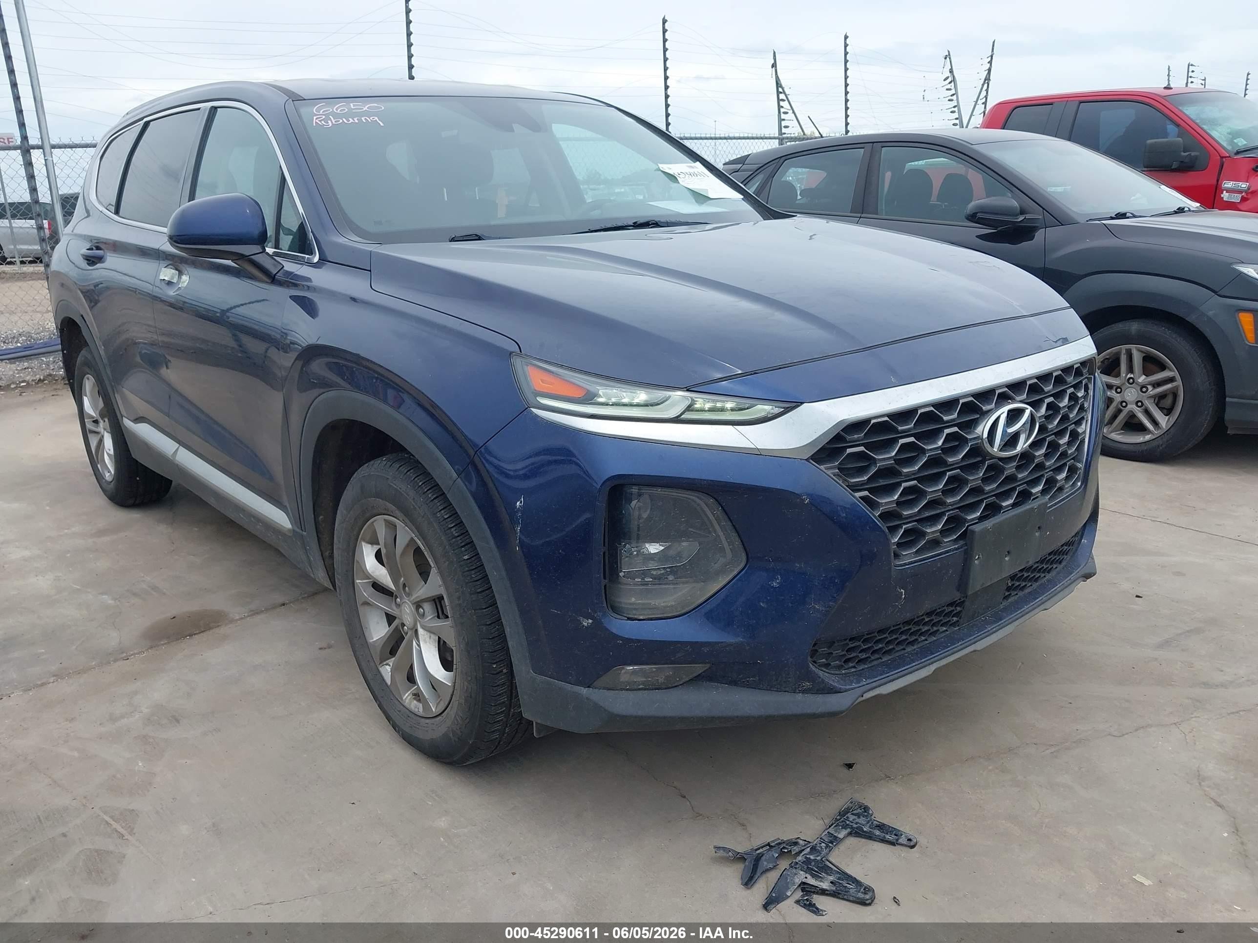 2020 Hyundai Santa Fe SEL, VIN 5NMS33AD7LH299476 — Rear end