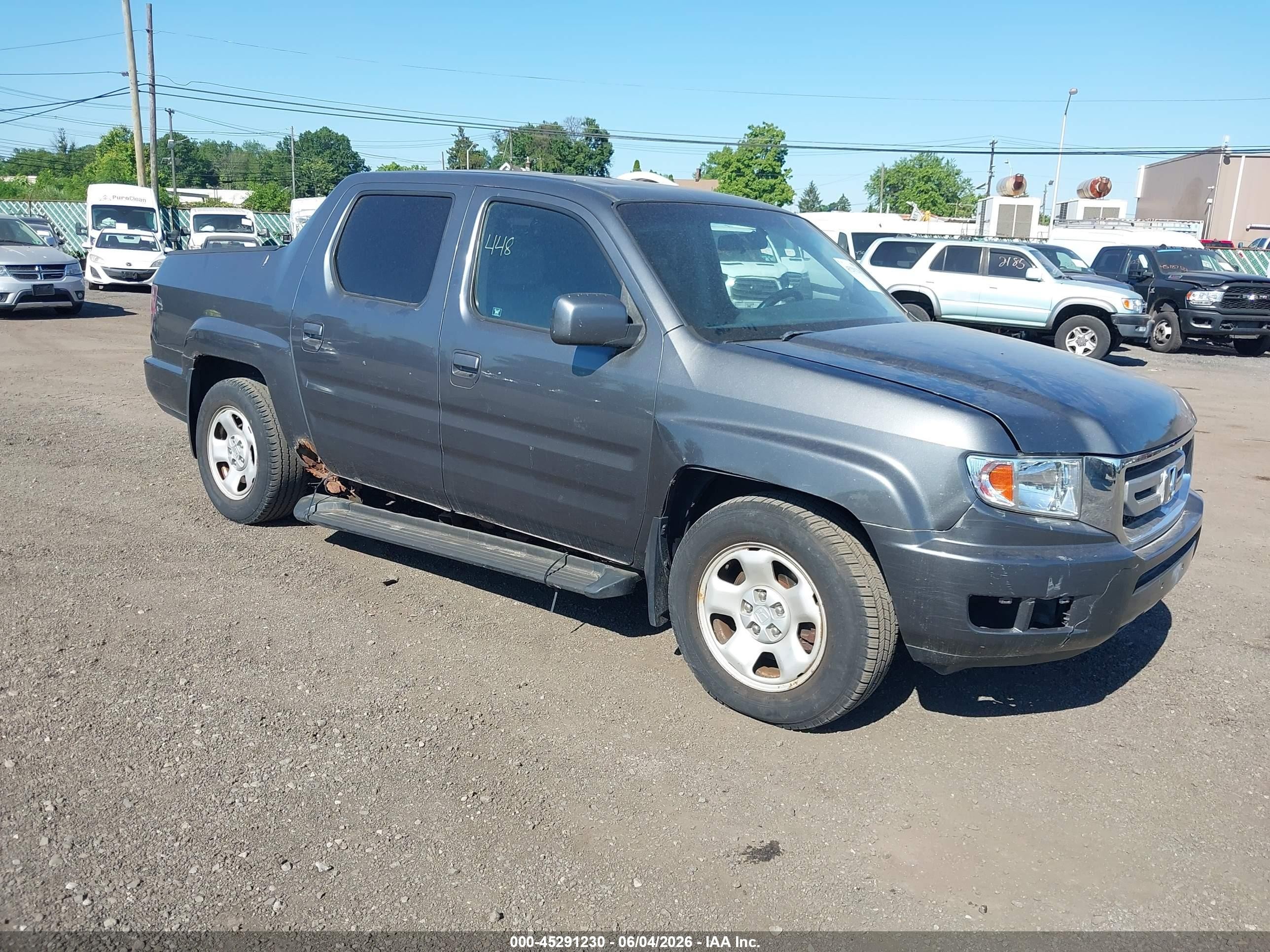 2010 Honda Ridgeline RTL, VIN 5FPYK1F54AB001782 — Auction photo