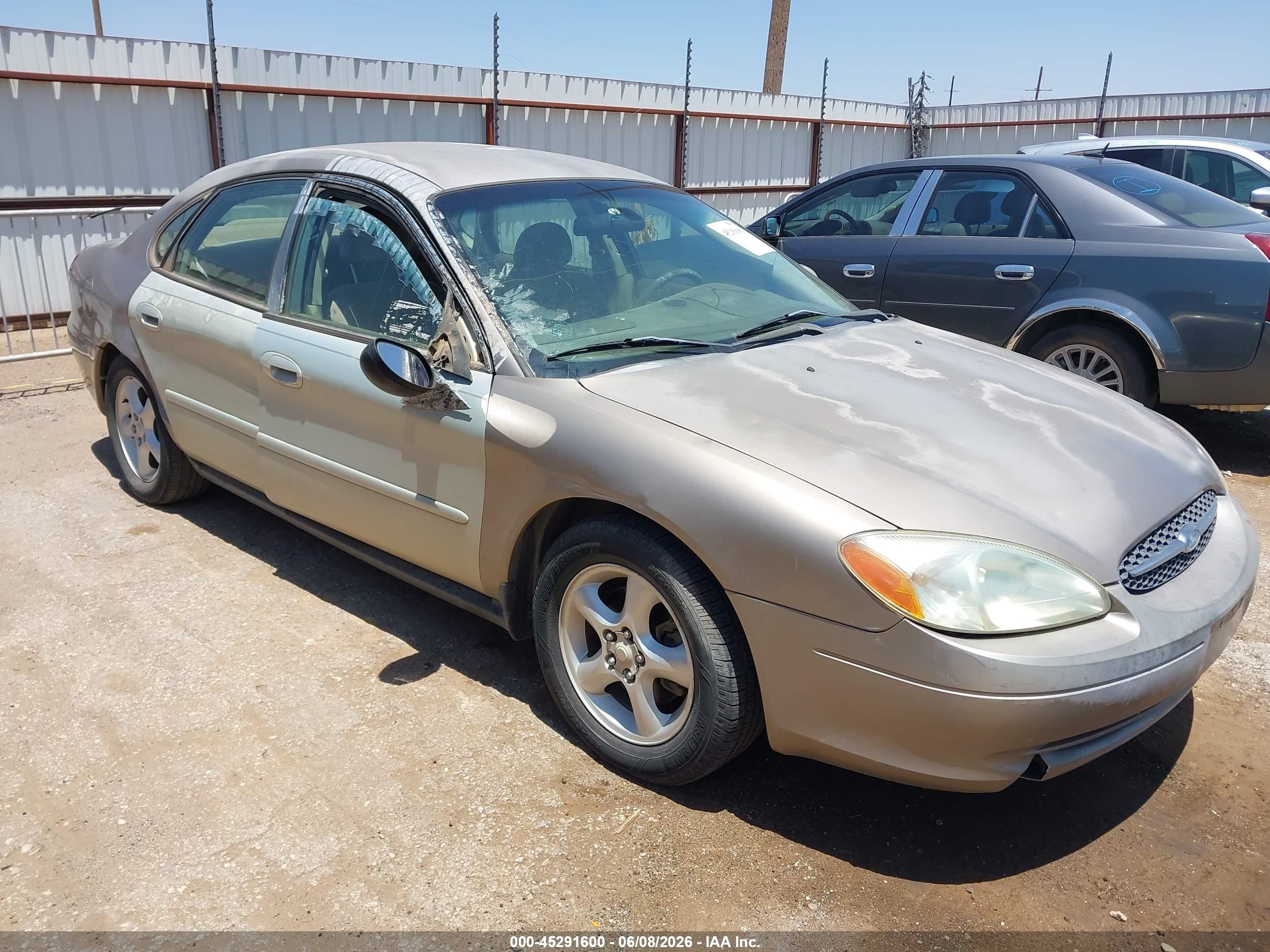 2002 Ford Taurus SES Standard, VIN 1FAFP552X2A232508 — Hail