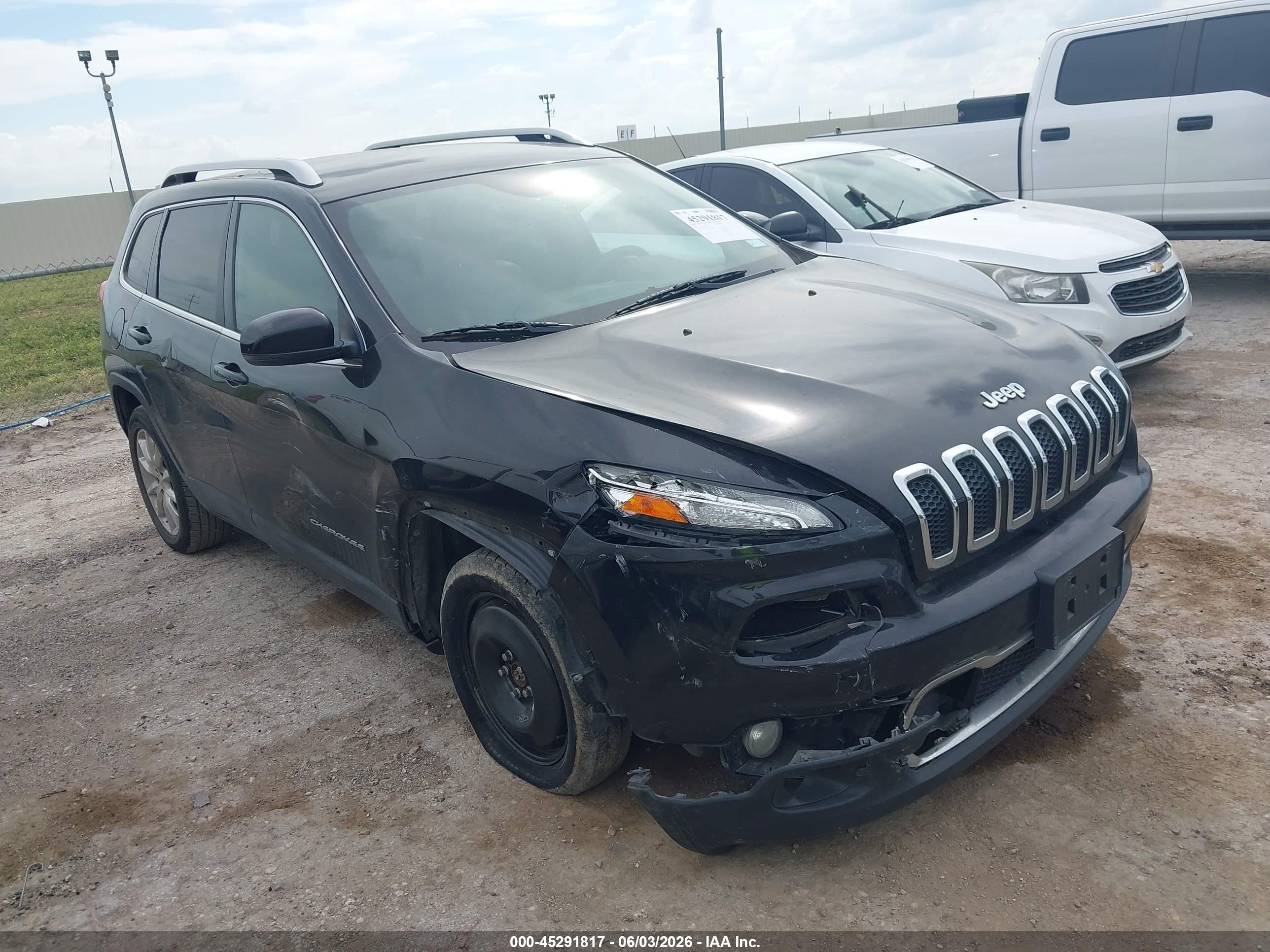 2015 Jeep Cherokee Limited, VIN 1C4PJLDS4FW566855 — Бок