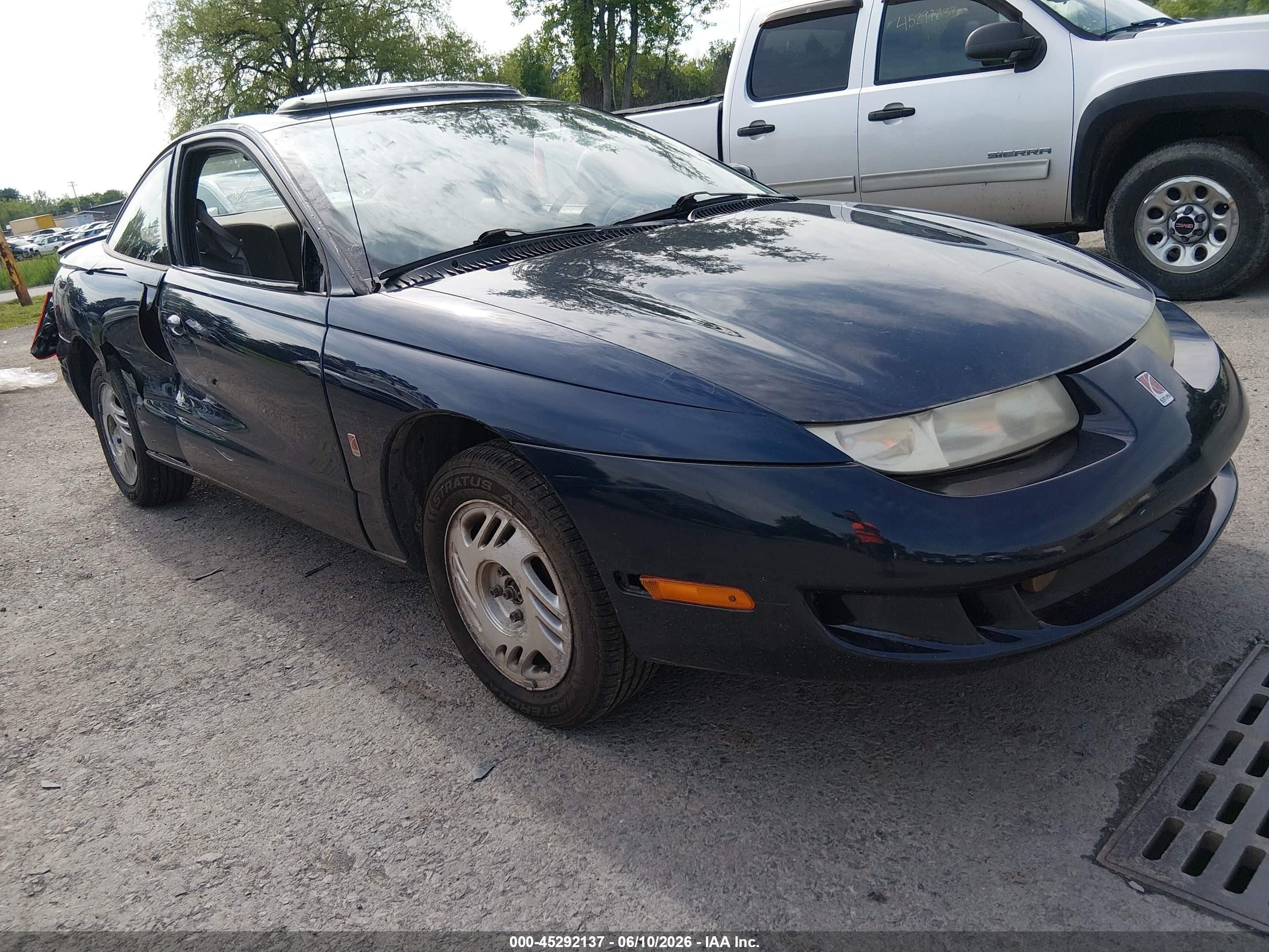1999 Saturn SC, VIN 1G8ZG1270XZ202307 — Бок