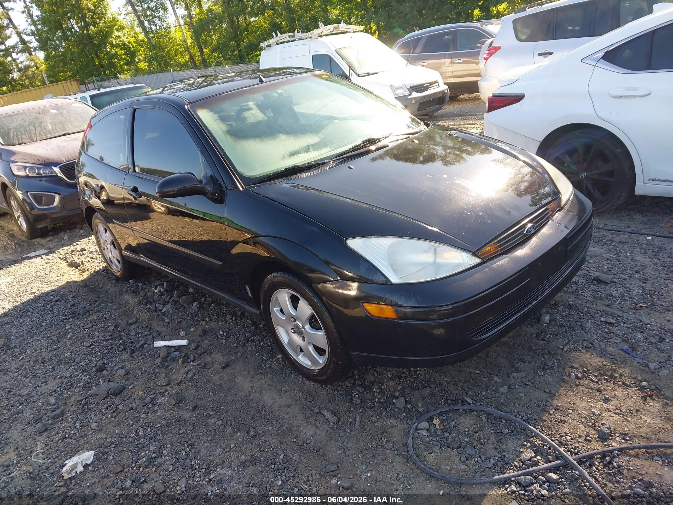 2002 Ford Focus ZX3, VIN 3FAFP31362R183476 — Бок