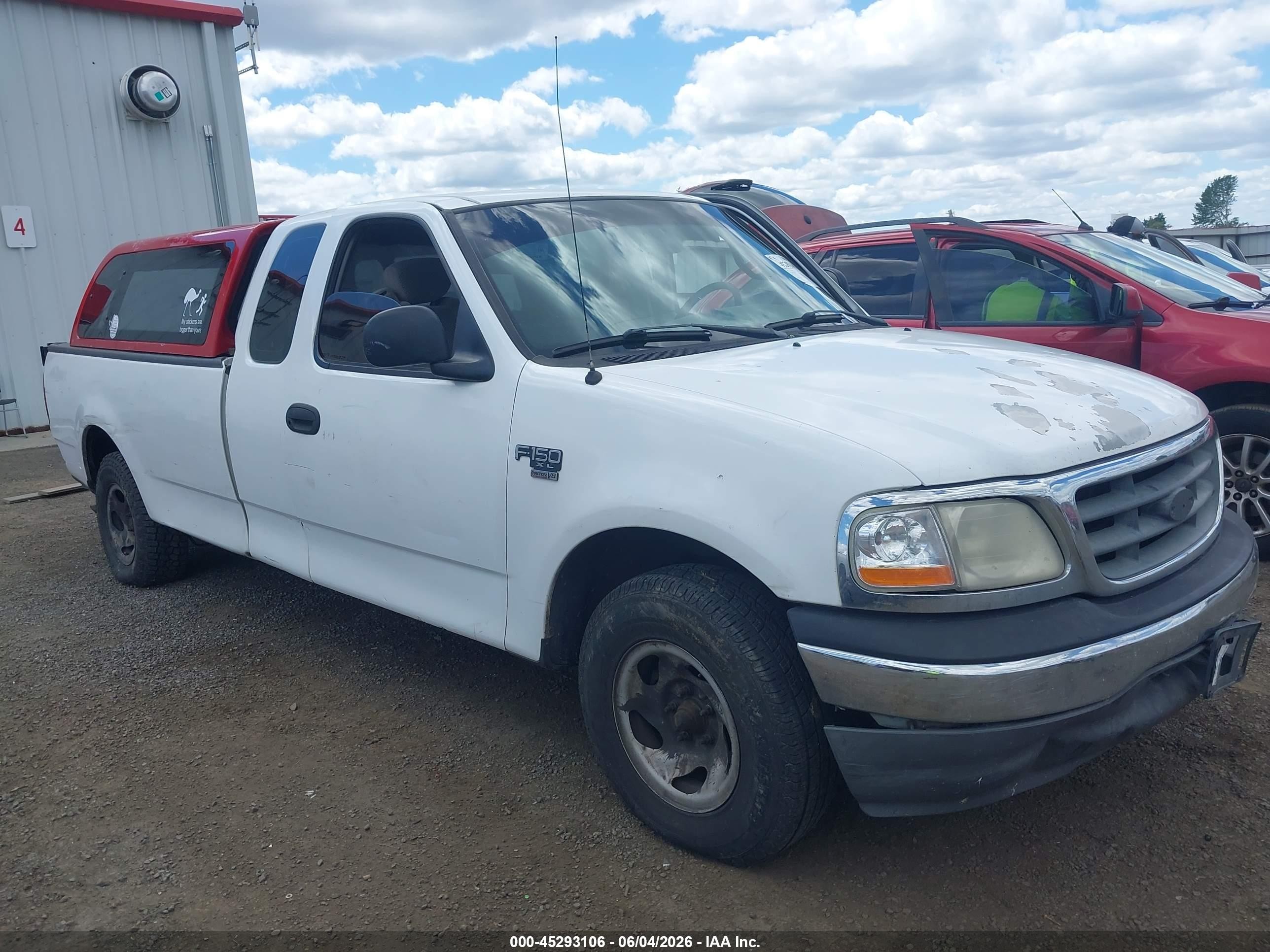 2002 Ford F-150 XL, VIN 1FTRX17LX2NA40097 — Side