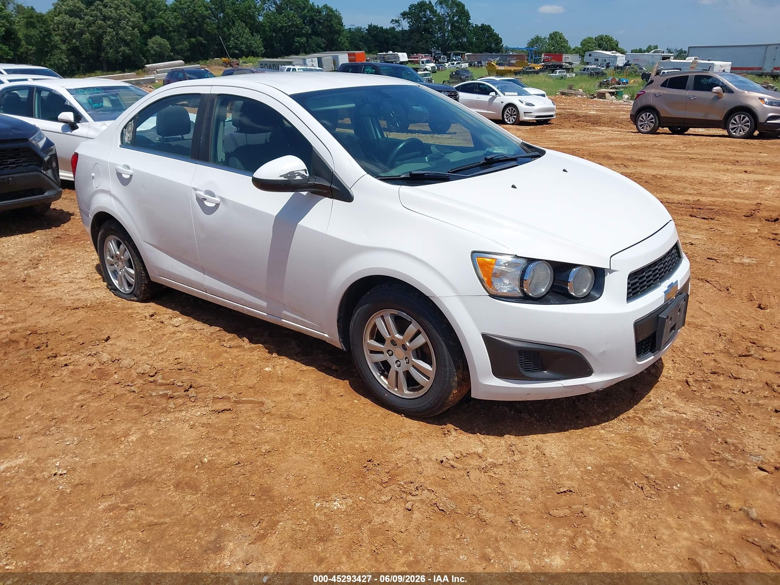 2015 Chevrolet Sonic LT, VIN 1G1JC5SG1F4169053 — Hail